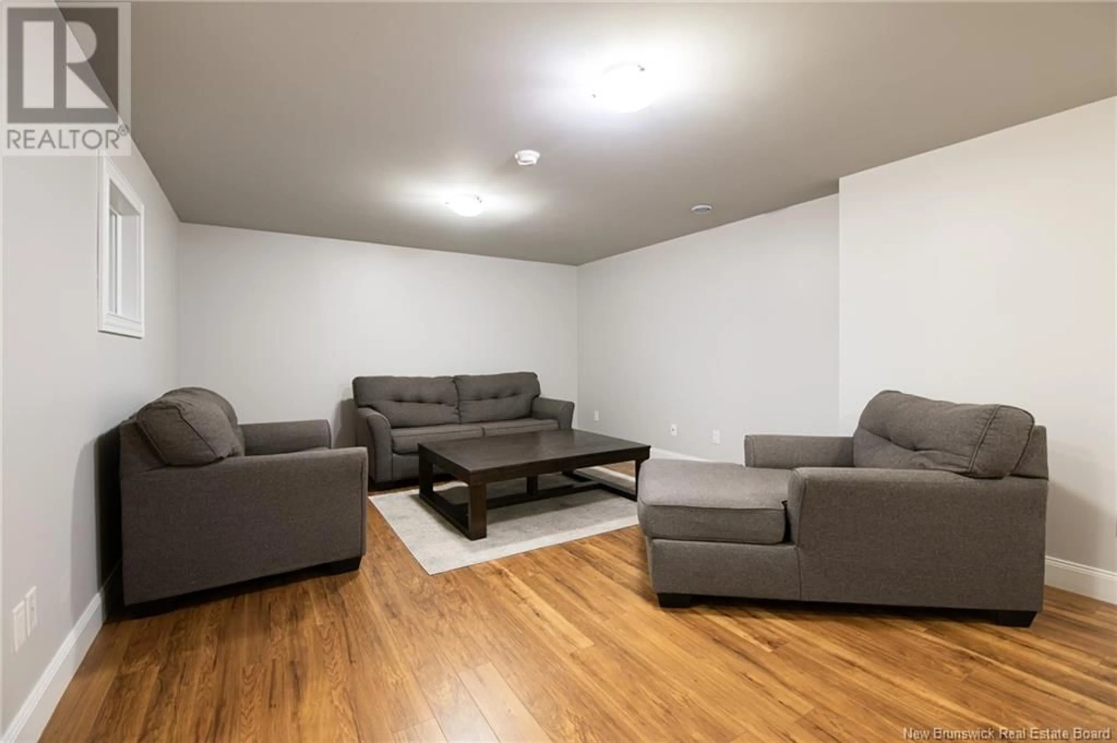 Living room with furniture, unknown for 11 LANCEFIELD CRESCENT, Moncton New Brunswick E1E0E7