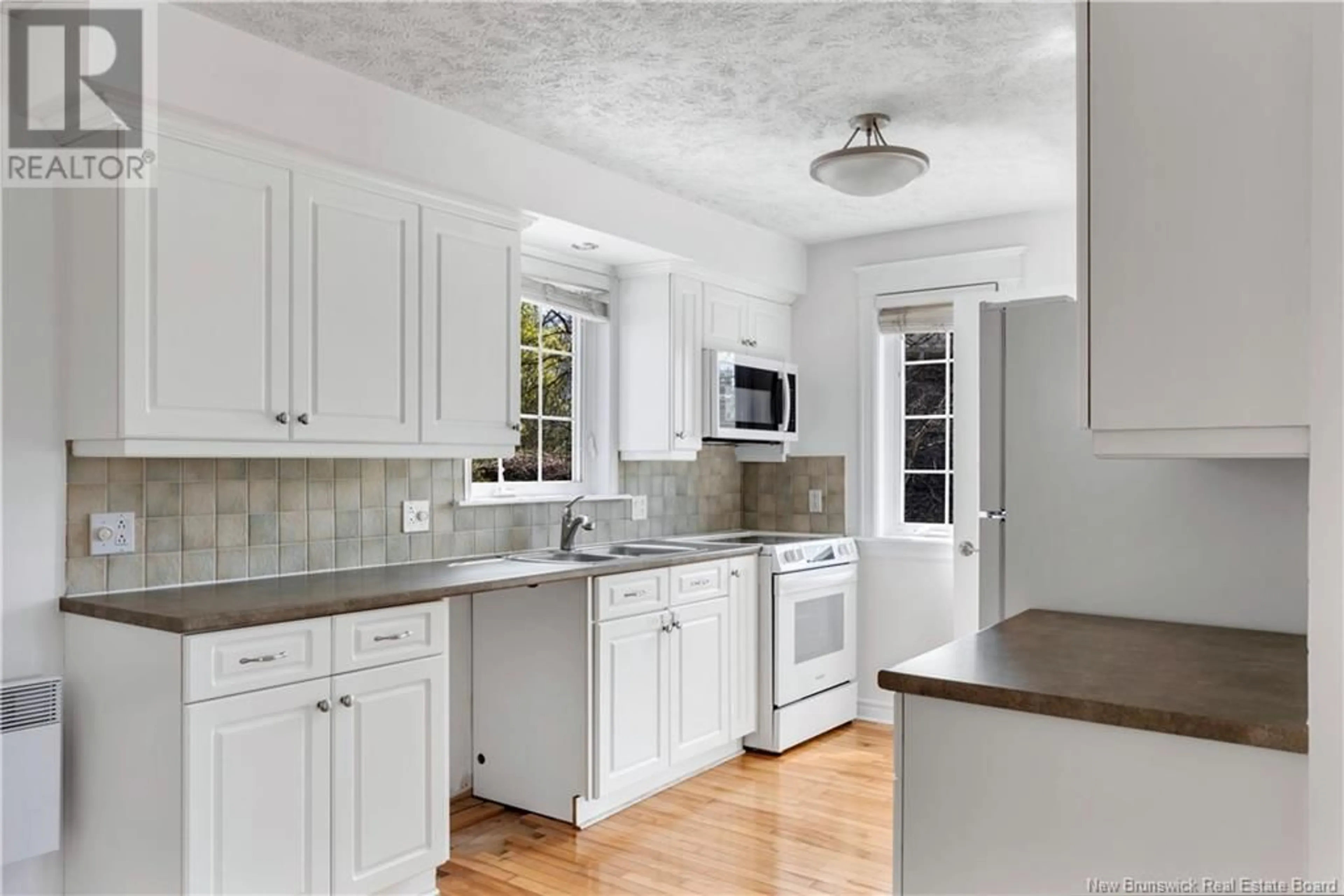 Open concept kitchen, ceramic/tile floor for 7-9 GLENWOOD DRIVE, Moncton New Brunswick E1A2M8