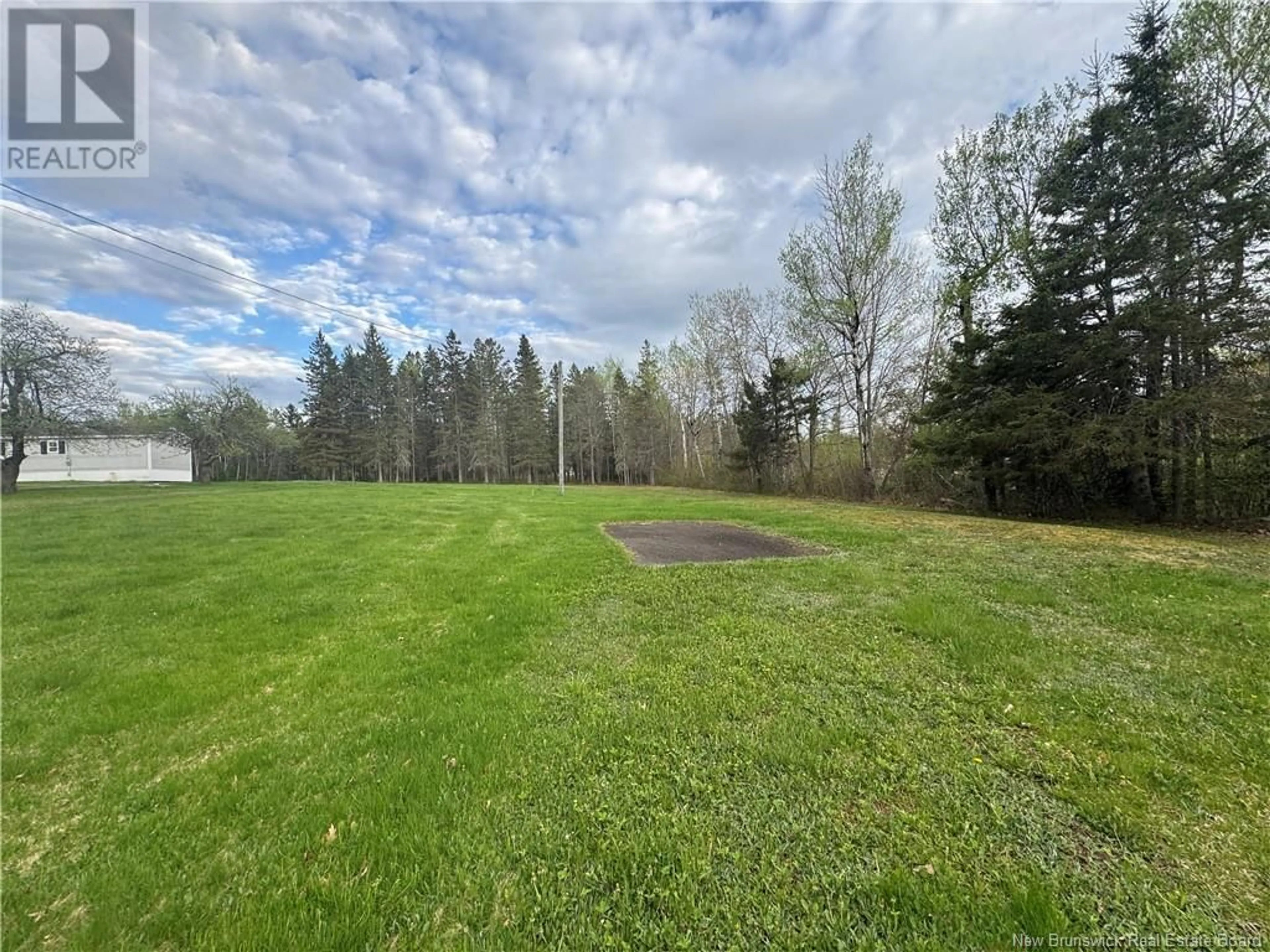 A pic from outside/outdoor area/front of a property/back of a property/a pic from drone, forest/trees view for 19 COX POINT ROAD, Cumberland Bay New Brunswick E4A2X1