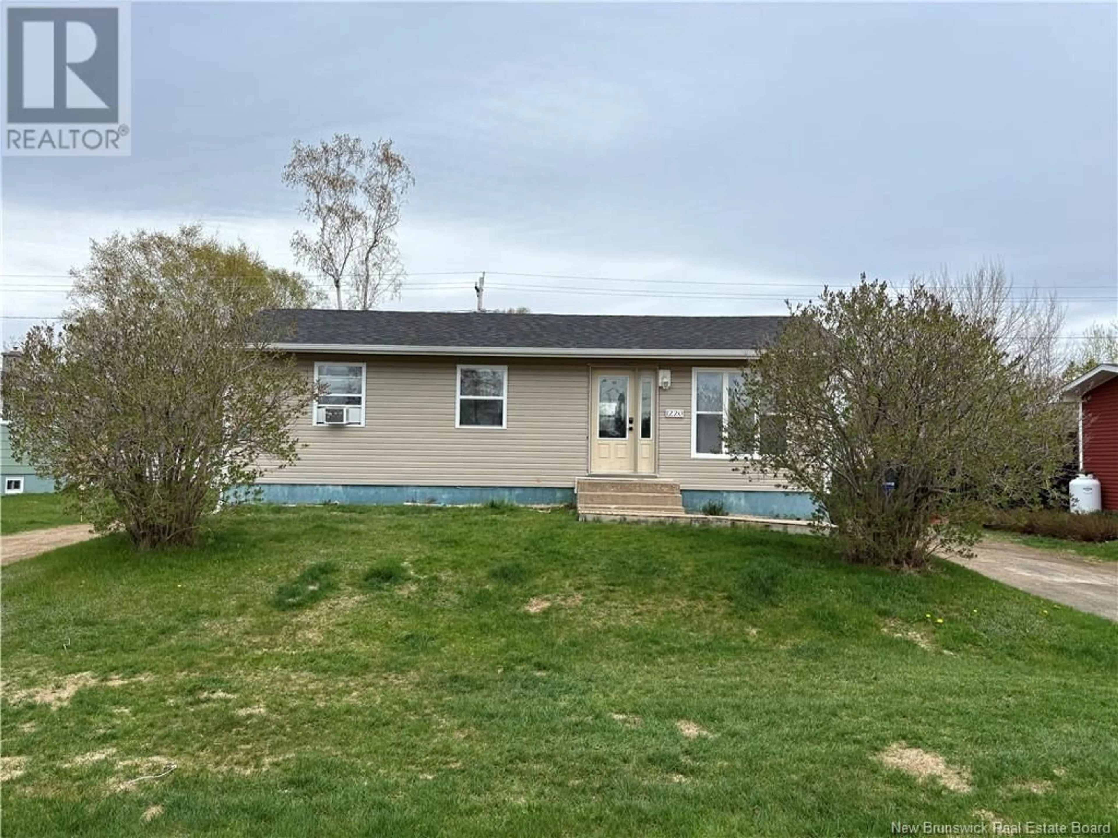 A pic from outside/outdoor area/front of a property/back of a property/a pic from drone, unknown for 1220 VANTASSELL, Bathurst New Brunswick E2A4C8