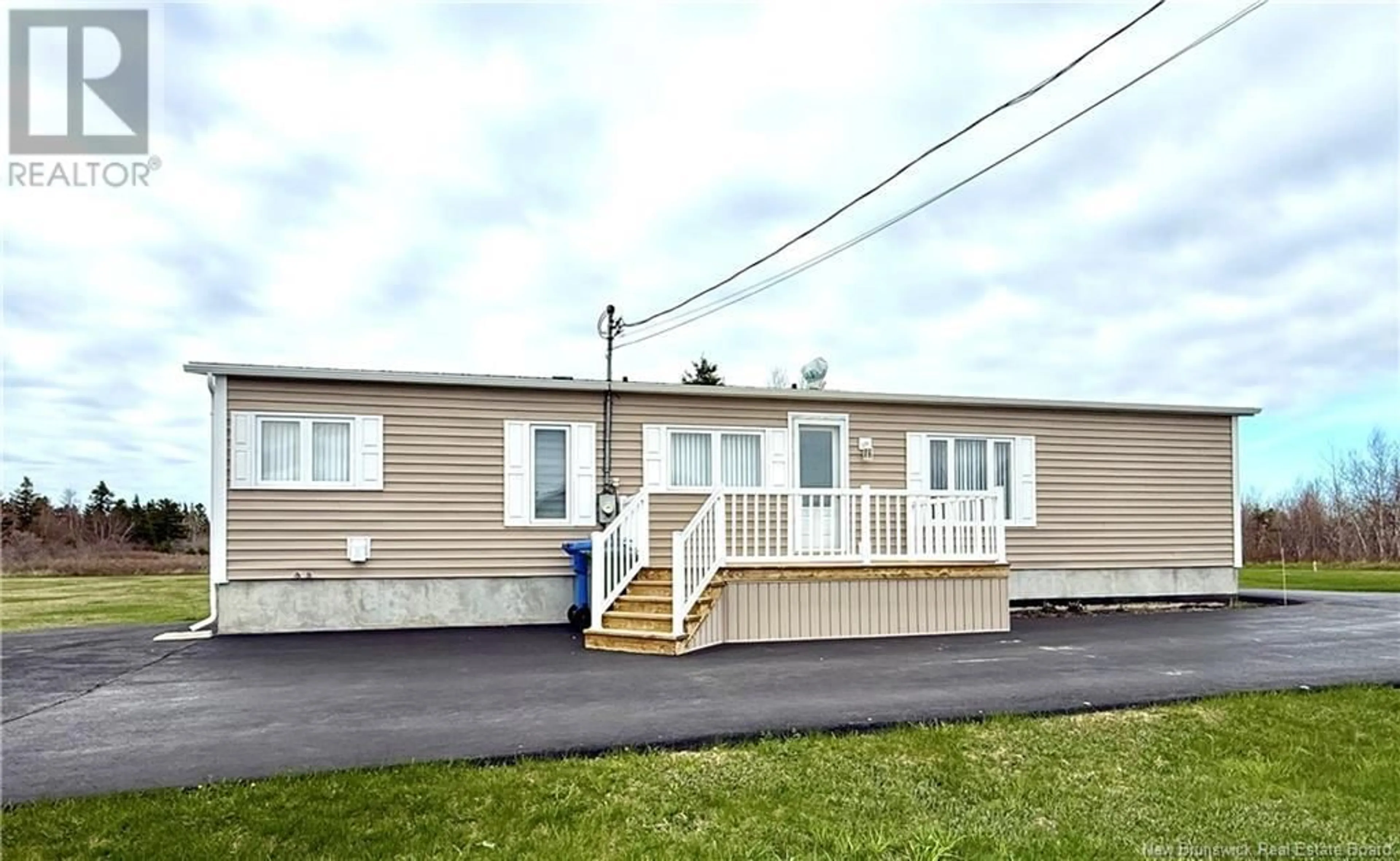 Home with vinyl exterior material, street for 59 RUE RAYMOND MARIE, Pointe-Brûlée New Brunswick E8S2W8