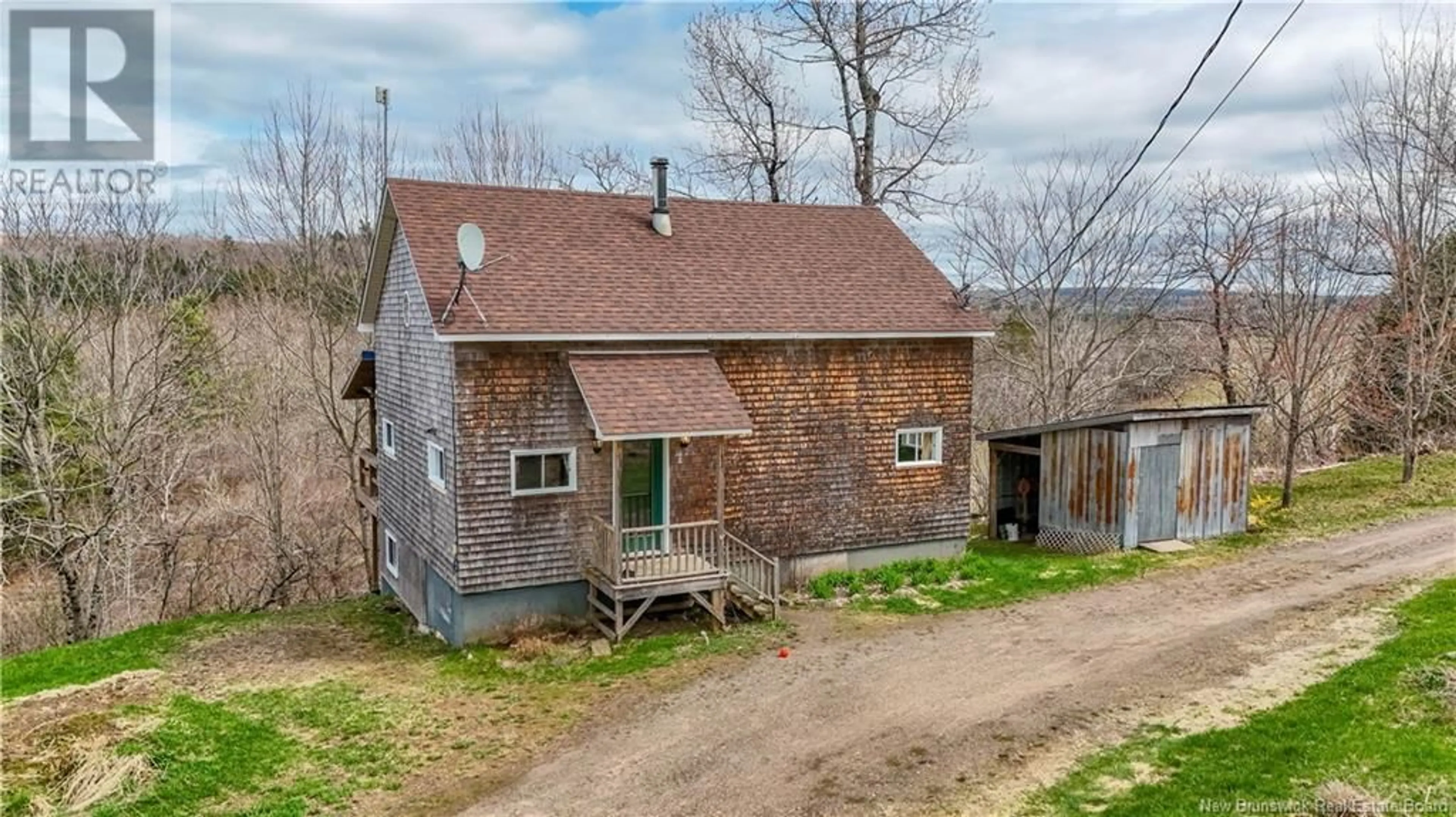A pic from outside/outdoor area/front of a property/back of a property/a pic from drone, building for 198 ROUTE 107, Nashwaak Bridge New Brunswick E6C2G5
