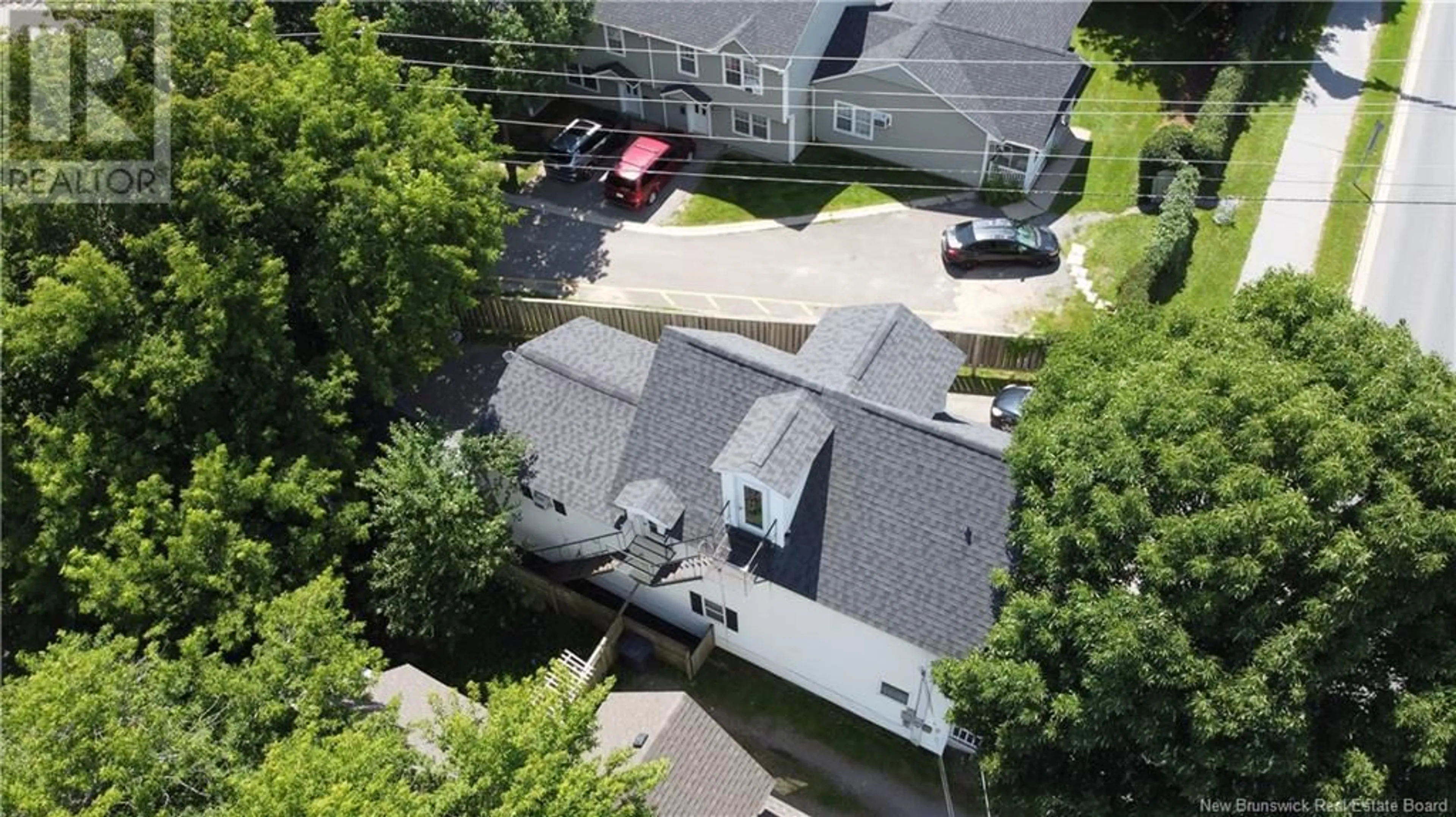 A pic from outside/outdoor area/front of a property/back of a property/a pic from drone, street for 420 SMYTHE STREET, Fredericton New Brunswick E3B3E5
