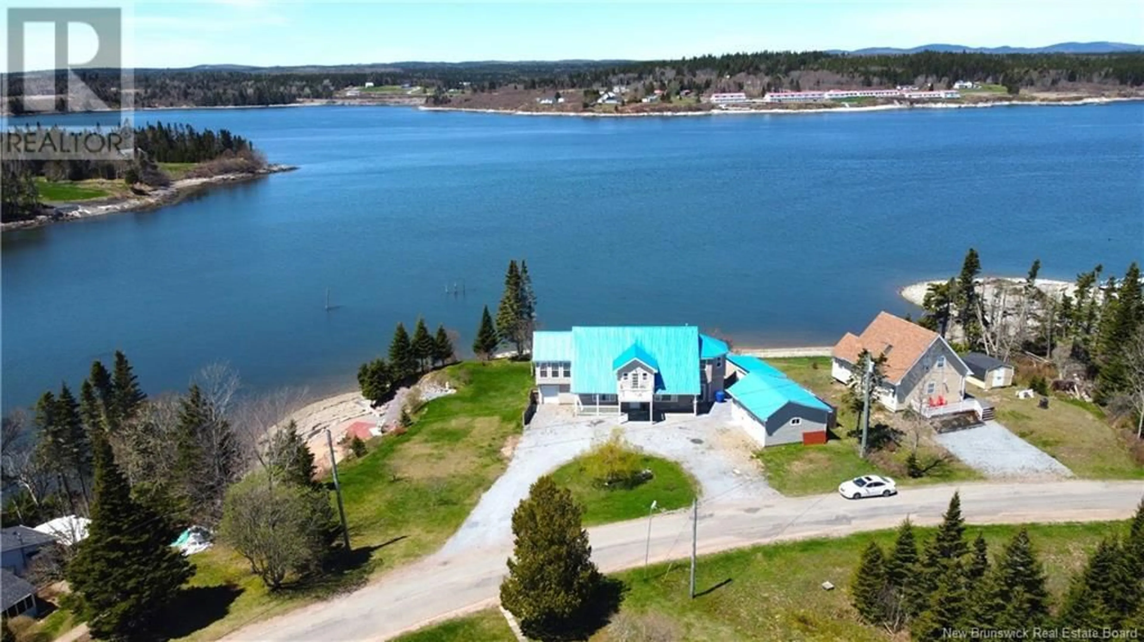 A pic from outside/outdoor area/front of a property/back of a property/a pic from drone, water/lake/river/ocean view for 233 MCCARTHY'S POINT ROAD, Pocologan New Brunswick E5J1A7