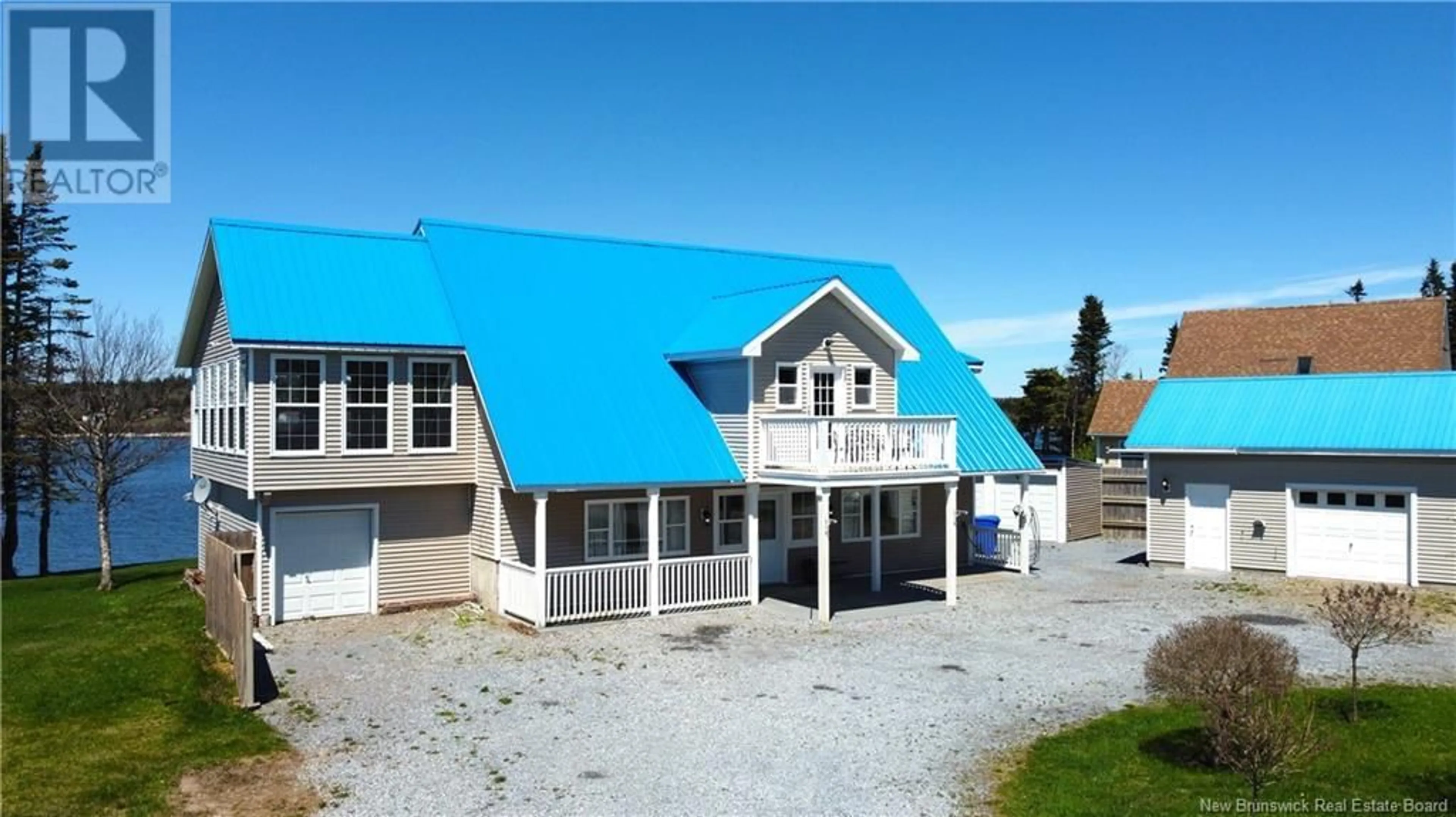 A pic from outside/outdoor area/front of a property/back of a property/a pic from drone, building for 233 MCCARTHY'S POINT ROAD, Pocologan New Brunswick E5J1A7