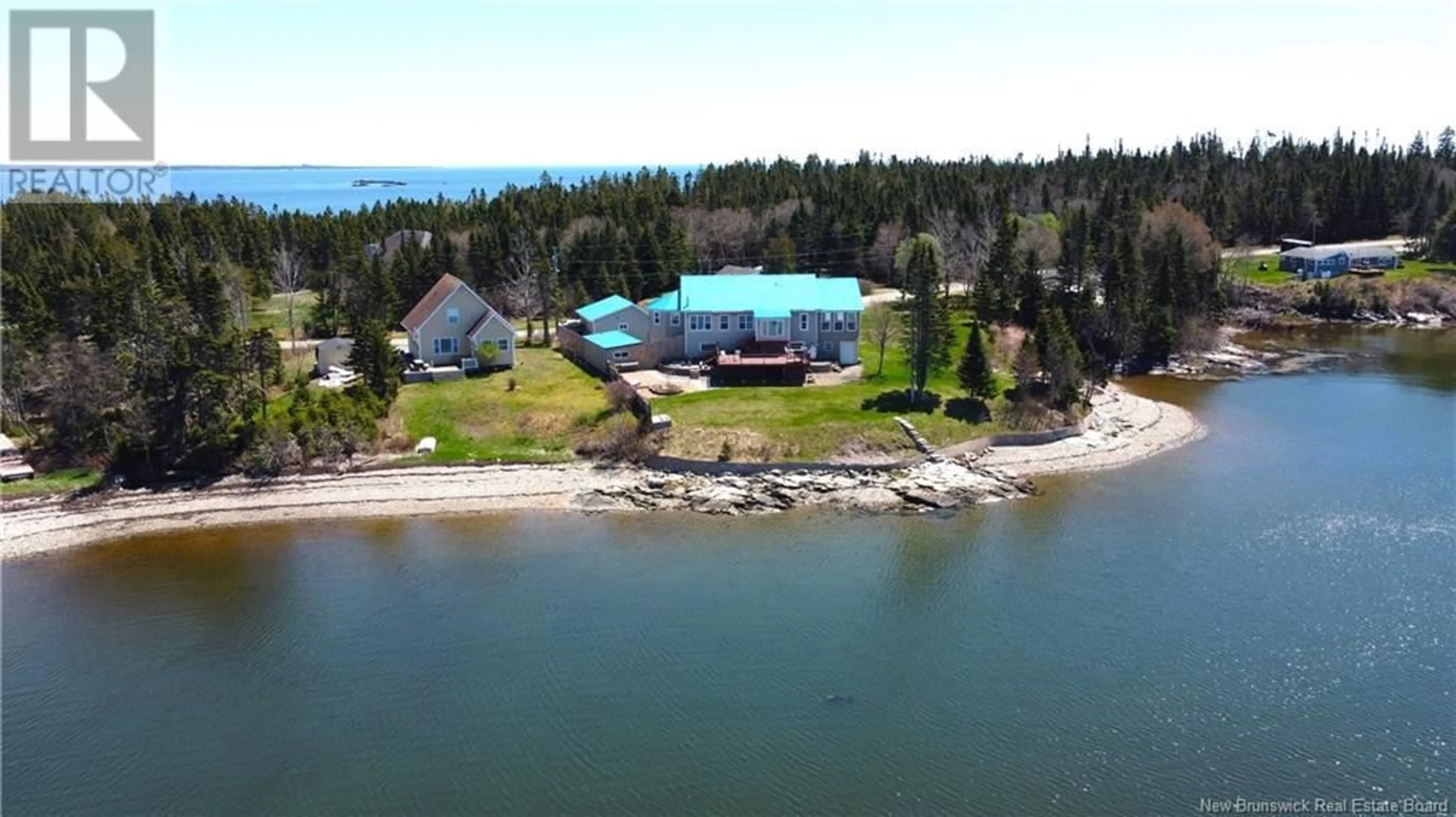 A pic from outside/outdoor area/front of a property/back of a property/a pic from drone, water/lake/river/ocean view for 233 MCCARTHY'S POINT ROAD, Pocologan New Brunswick E5J1A7