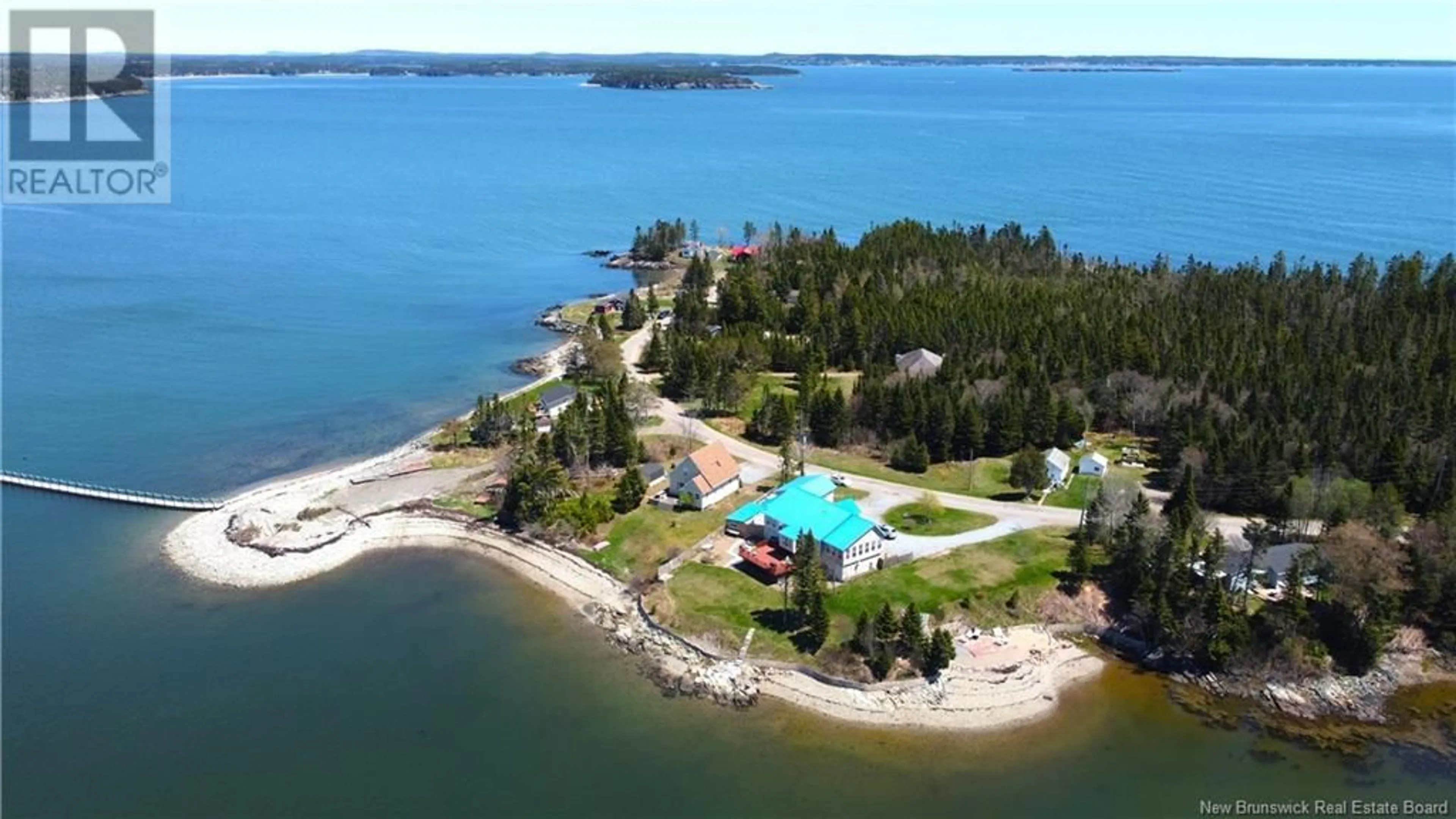 A pic from outside/outdoor area/front of a property/back of a property/a pic from drone, water/lake/river/ocean view for 233 MCCARTHY'S POINT ROAD, Pocologan New Brunswick E5J1A7
