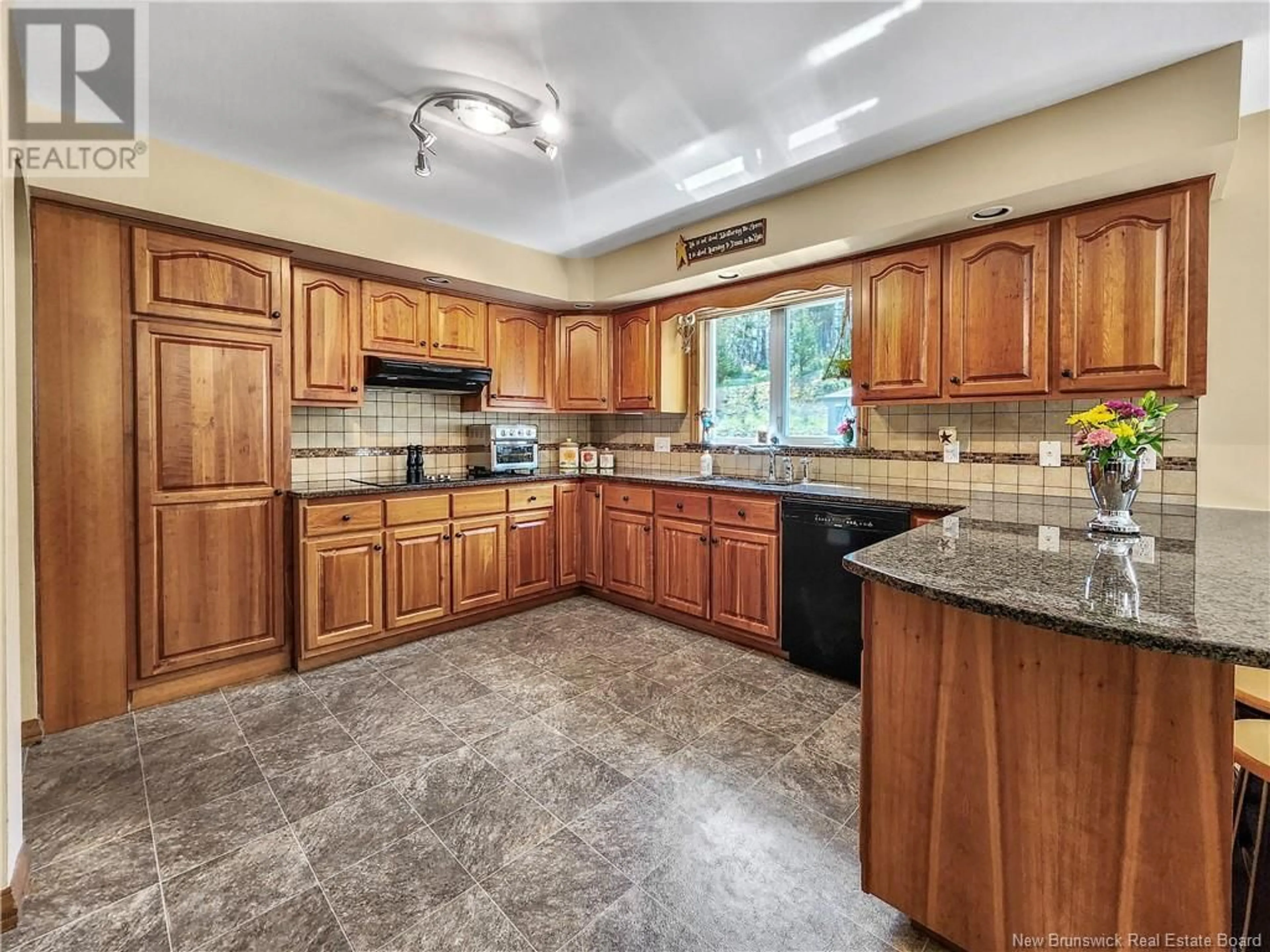 Open concept kitchen, ceramic/tile floor for 340 GAULT ROAD, Saint John New Brunswick E2M5H4