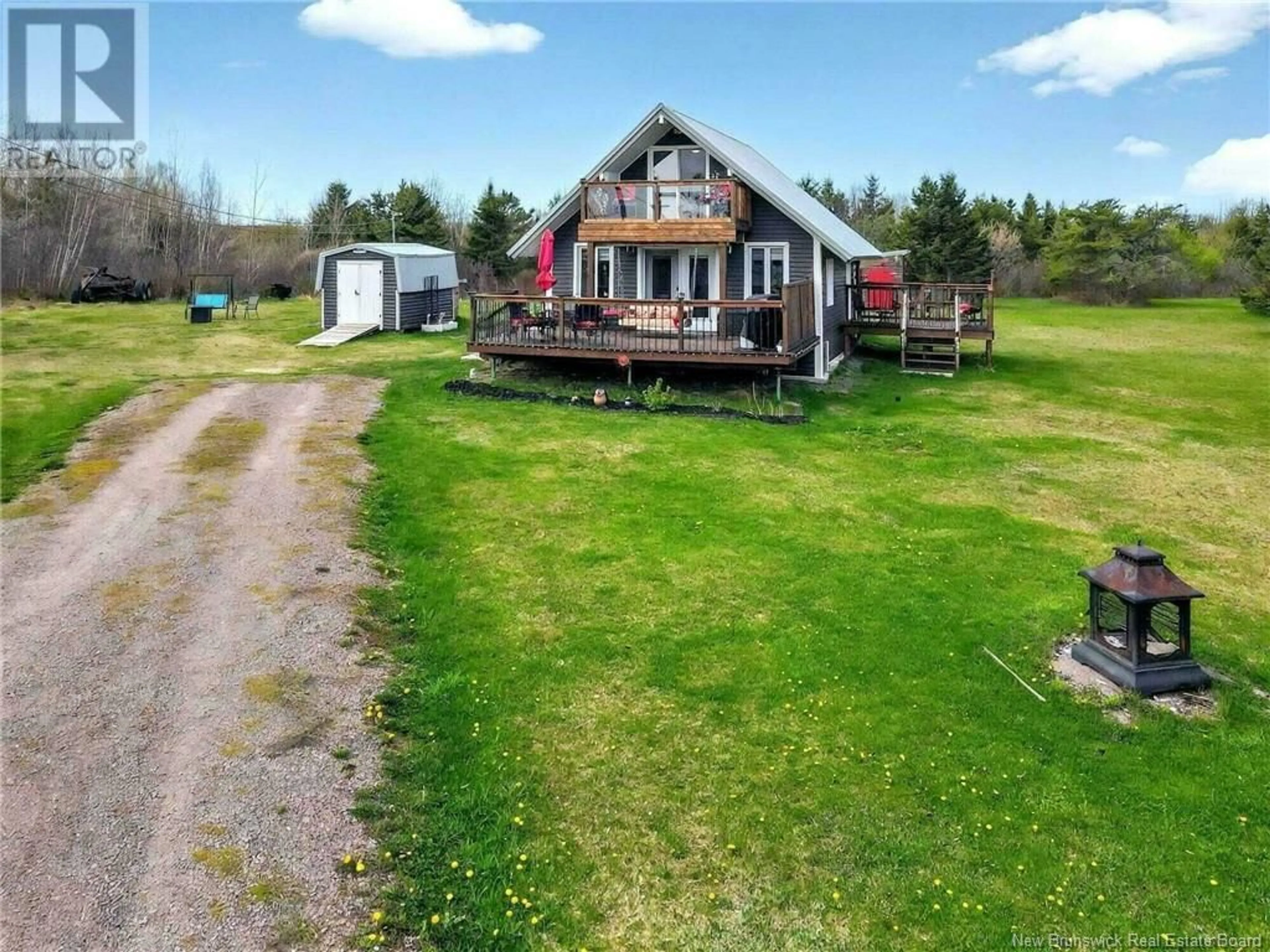 A pic from outside/outdoor area/front of a property/back of a property/a pic from drone, water/lake/river/ocean view for 15 CÔTE D'OR CRESCENT, Trois Ruisseaux New Brunswick E4N2V4