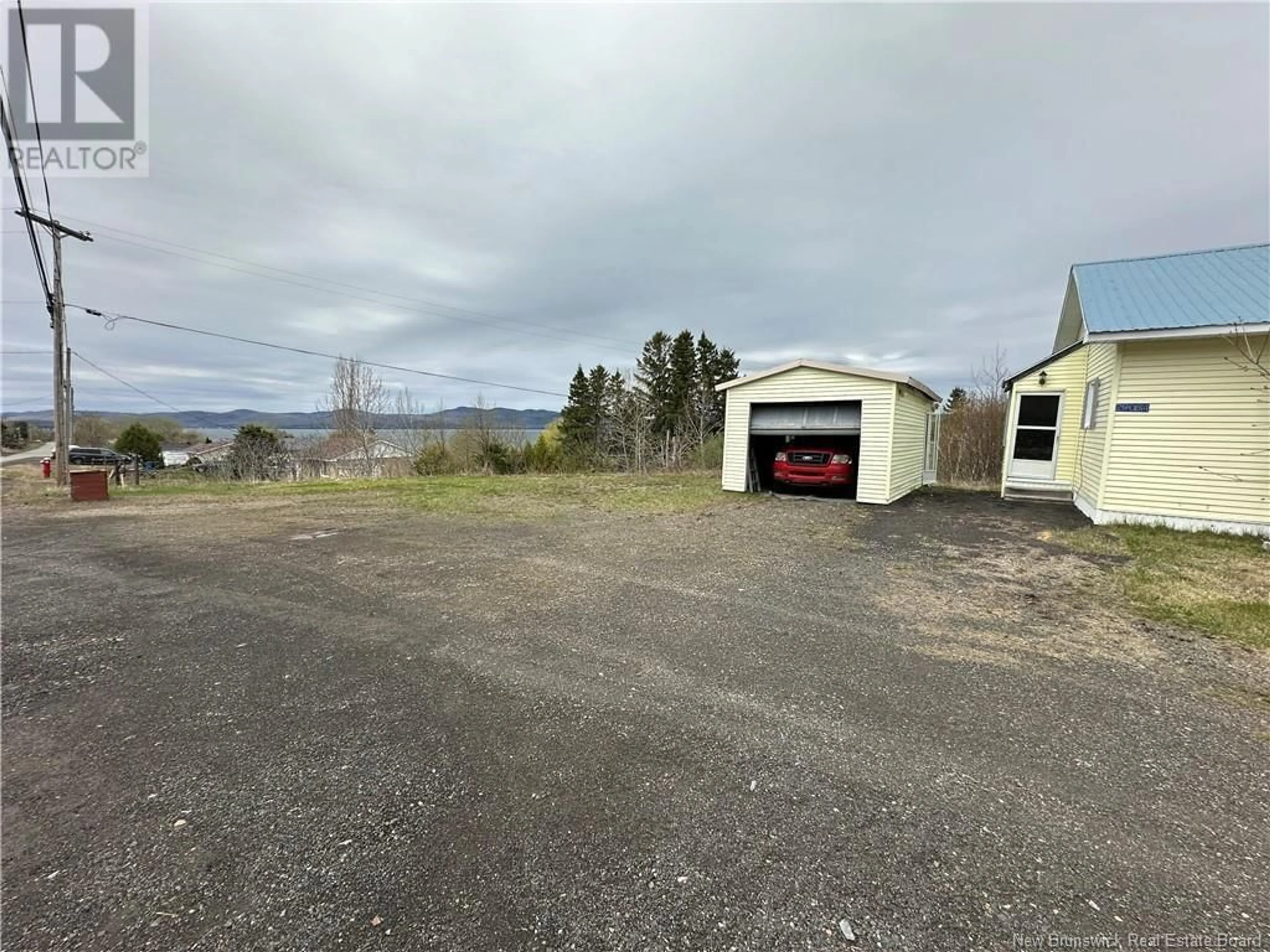 A pic from outside/outdoor area/front of a property/back of a property/a pic from drone, unknown for 29084 ROUTE 134, Point La Nim New Brunswick E3N6E2