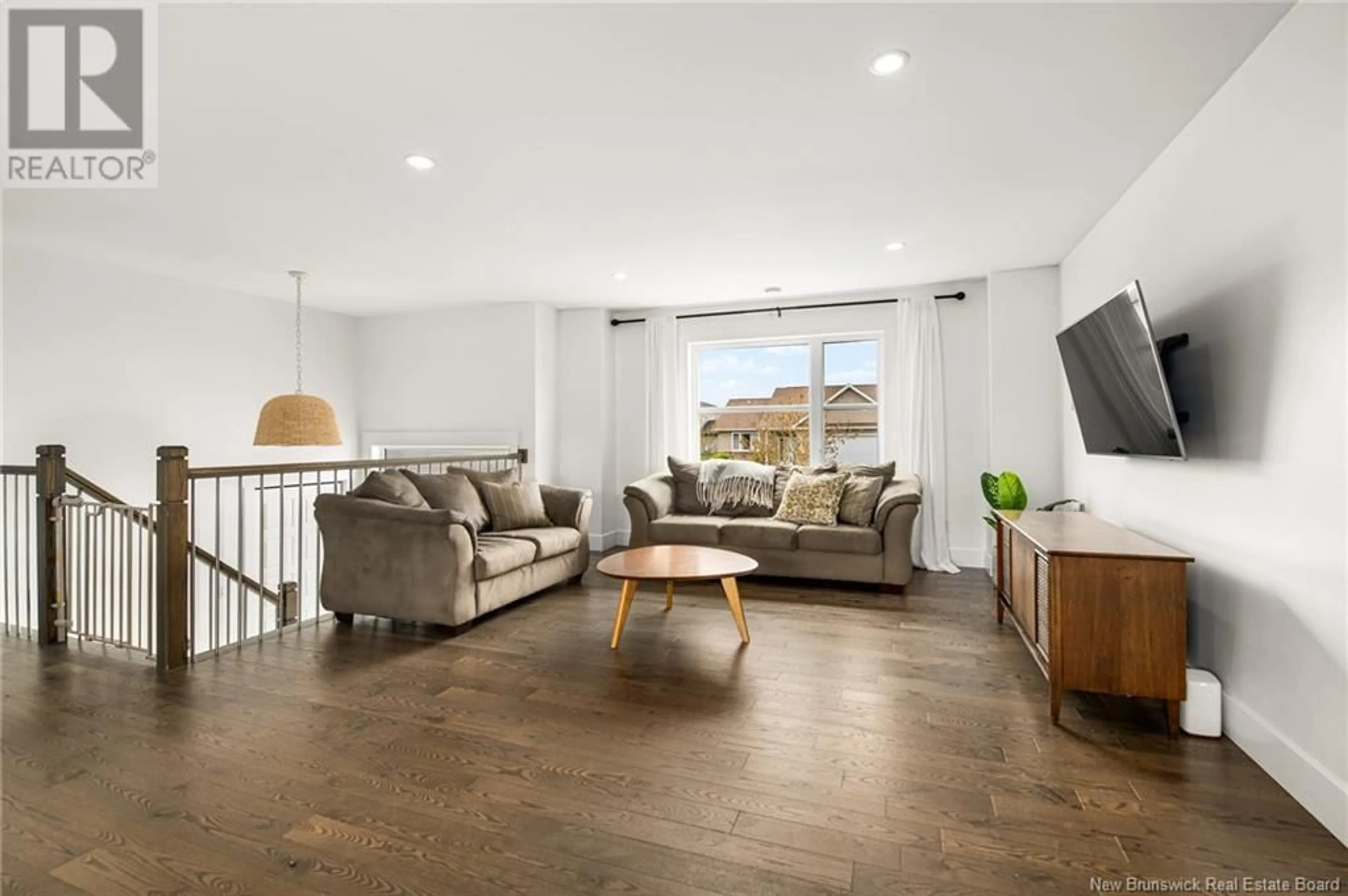 Living room with furniture, unknown for 21 PEBBLE CREEK WAY, Moncton New Brunswick E1E0C7