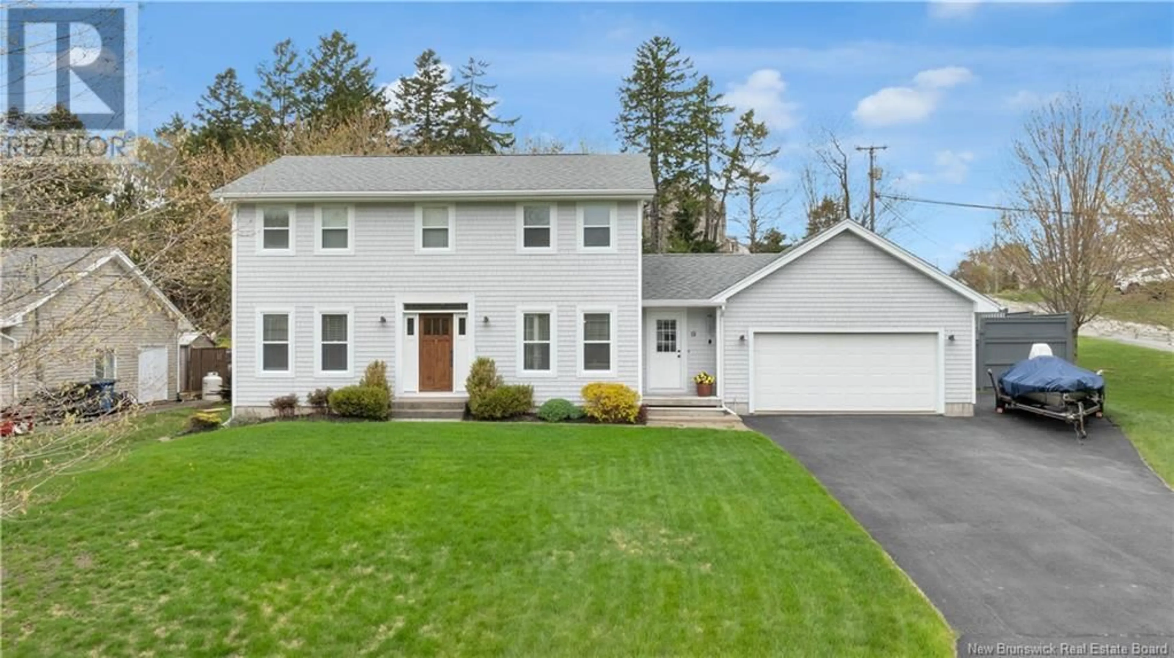 Home with vinyl exterior material, street for 91 QUEENSBURY DRIVE, Quispamsis New Brunswick E2E5Y7