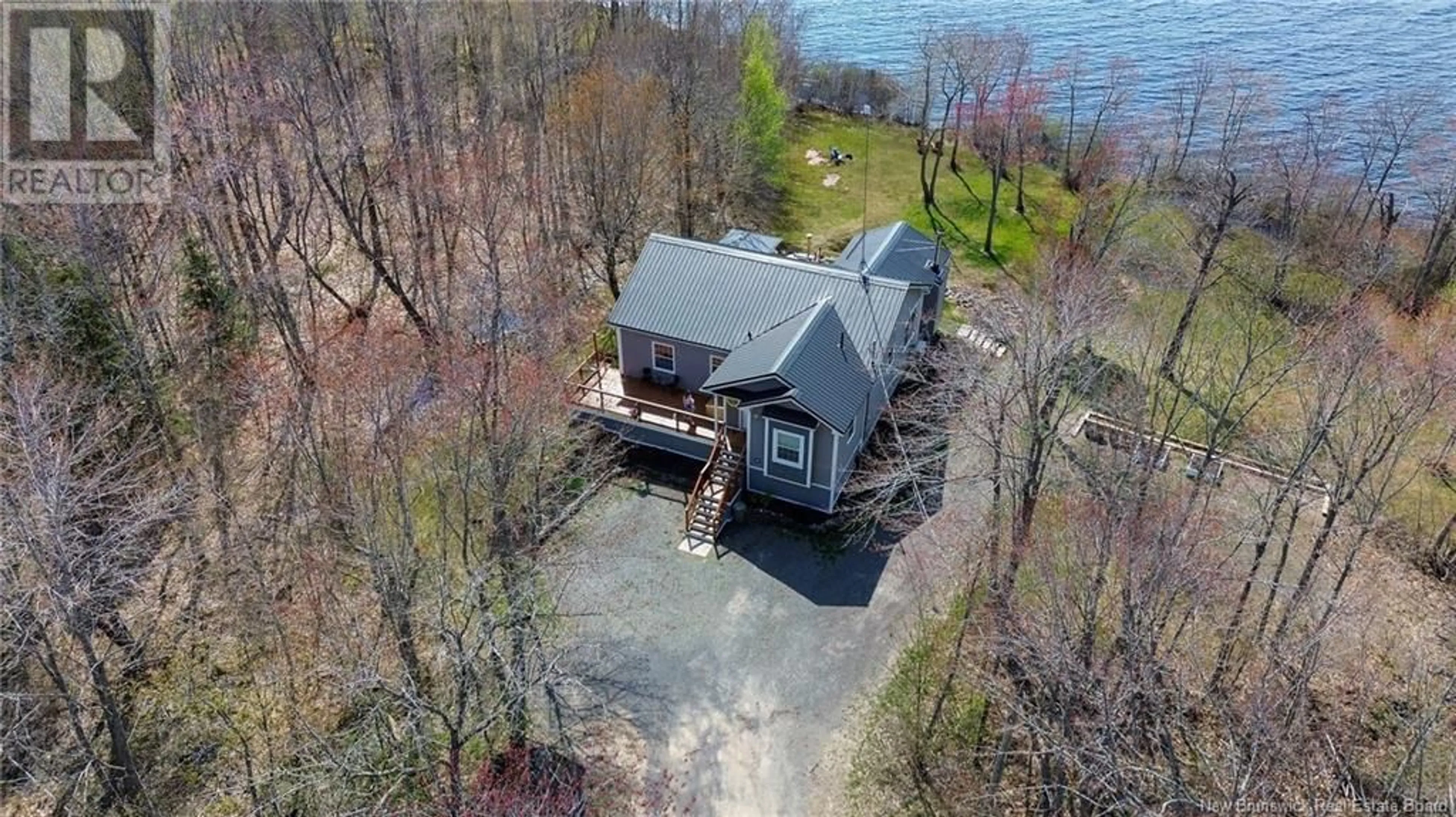A pic from outside/outdoor area/front of a property/back of a property/a pic from drone, water/lake/river/ocean view for 224 CHAPMAN ROAD, Newcastle Centre New Brunswick E4B2M1