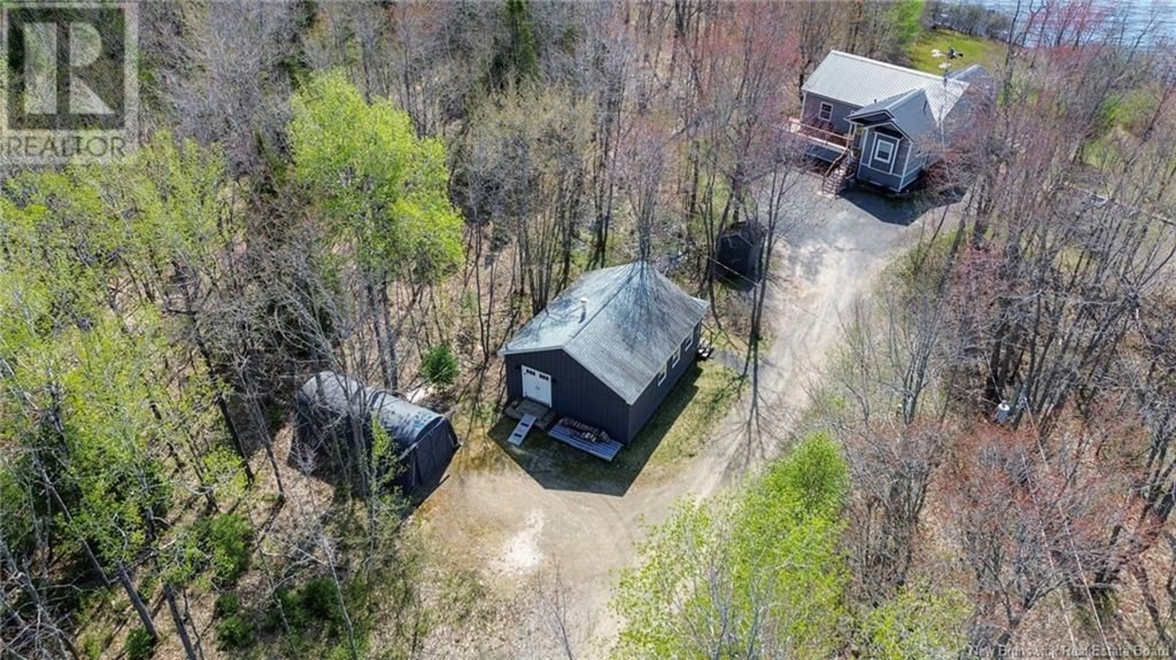 A pic from outside/outdoor area/front of a property/back of a property/a pic from drone, forest/trees view for 224 CHAPMAN ROAD, Newcastle Centre New Brunswick E4B2M1