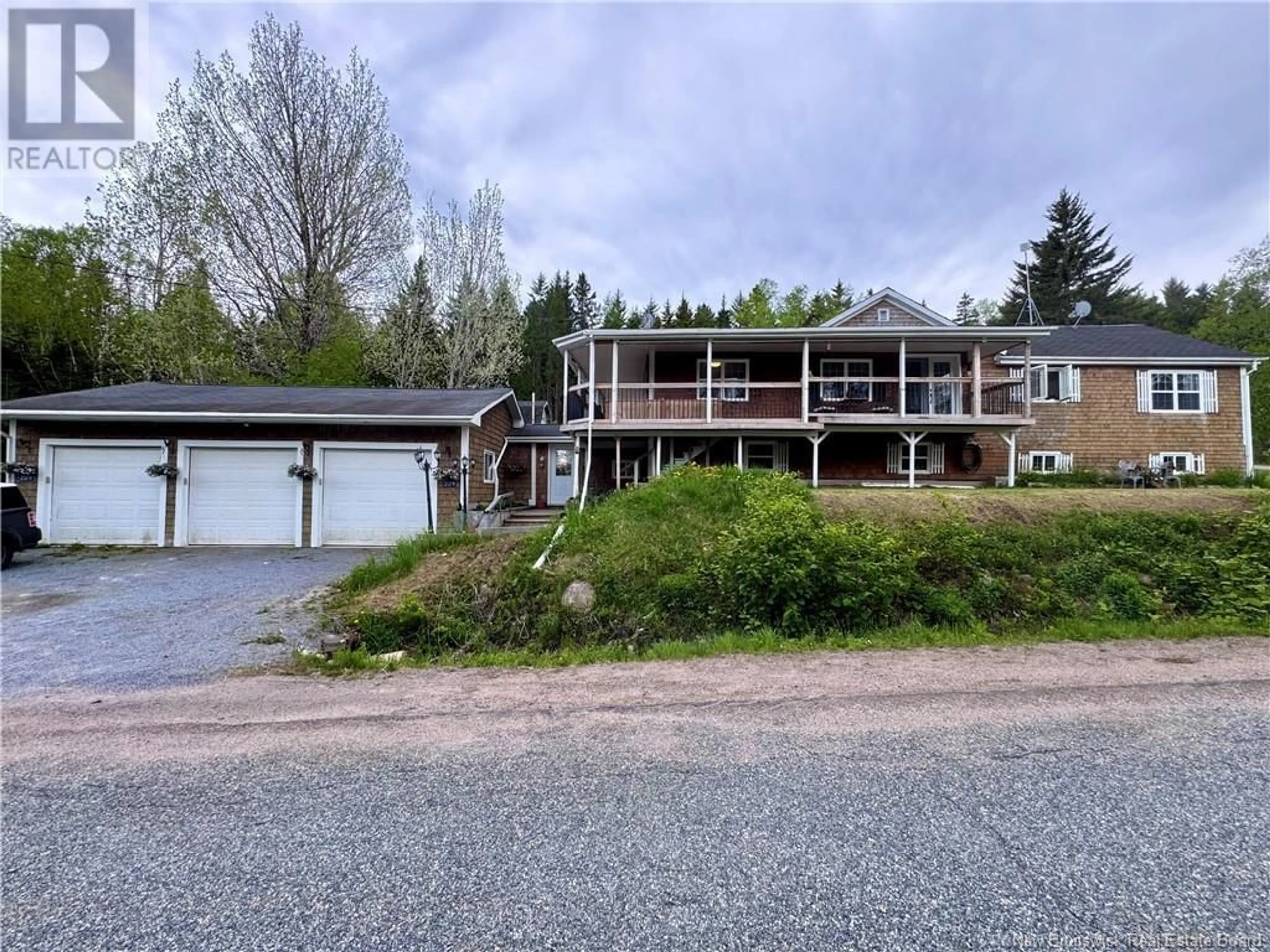 A pic from outside/outdoor area/front of a property/back of a property/a pic from drone, water/lake/river/ocean view for 209 WETMORE CREEK ROAD, Musquash New Brunswick E2J2L5