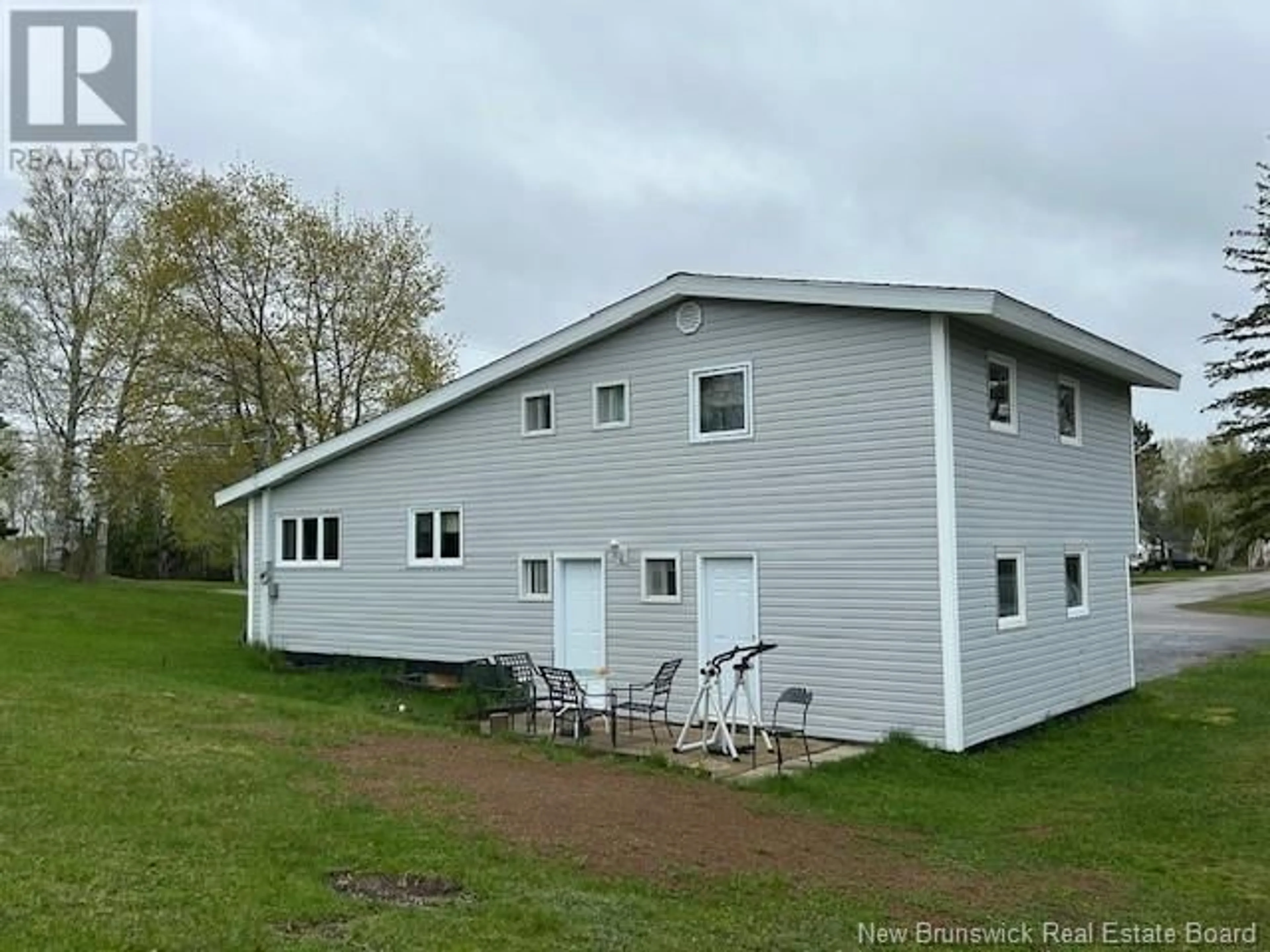 A pic from outside/outdoor area/front of a property/back of a property/a pic from drone, building for 1145 ULRIC DRIVE, Bathurst New Brunswick E2A3X9