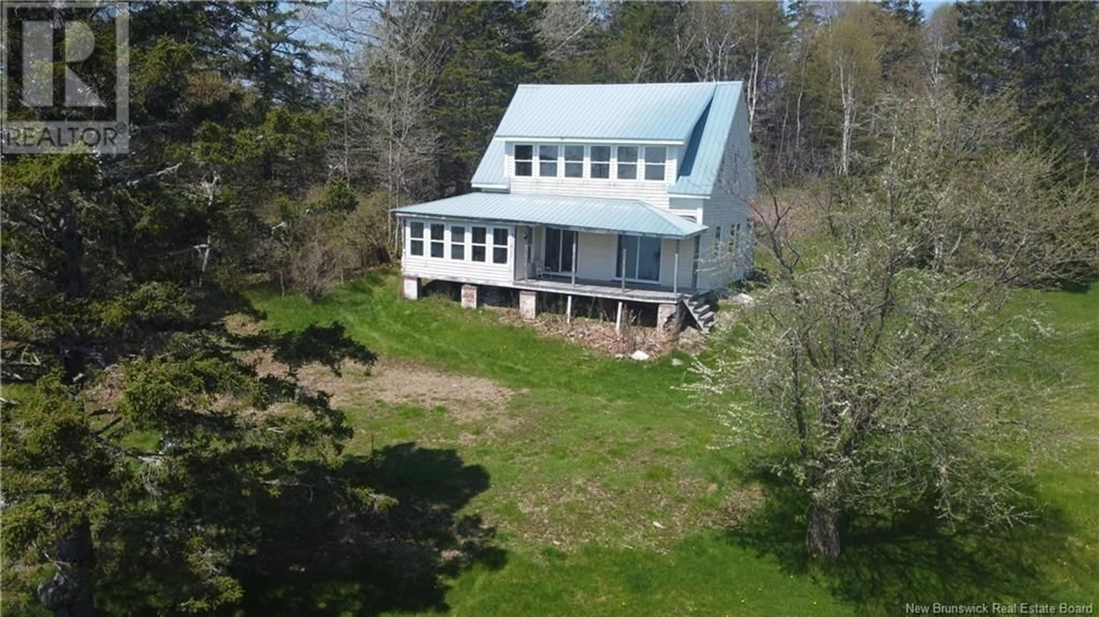 A pic from outside/outdoor area/front of a property/back of a property/a pic from drone, water/lake/river/ocean view for 1212 ROUTE 772, Cummings Cove New Brunswick E5V1V3