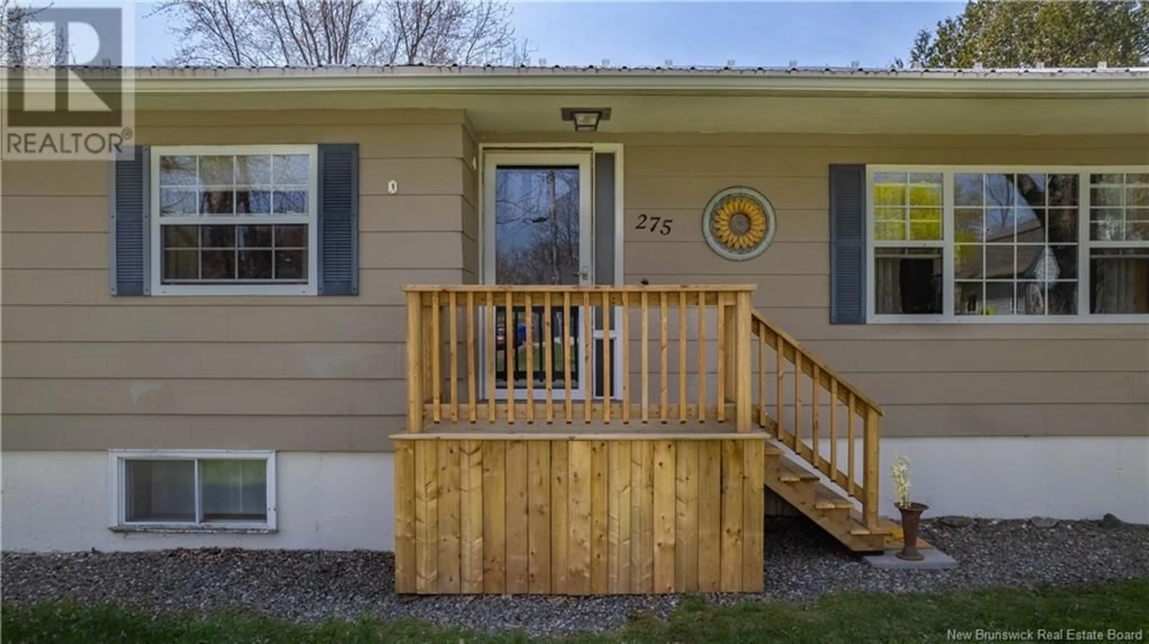 Home with vinyl exterior material, street for 275 PRINCE OF WALES, Saint Andrews New Brunswick E5B1P6