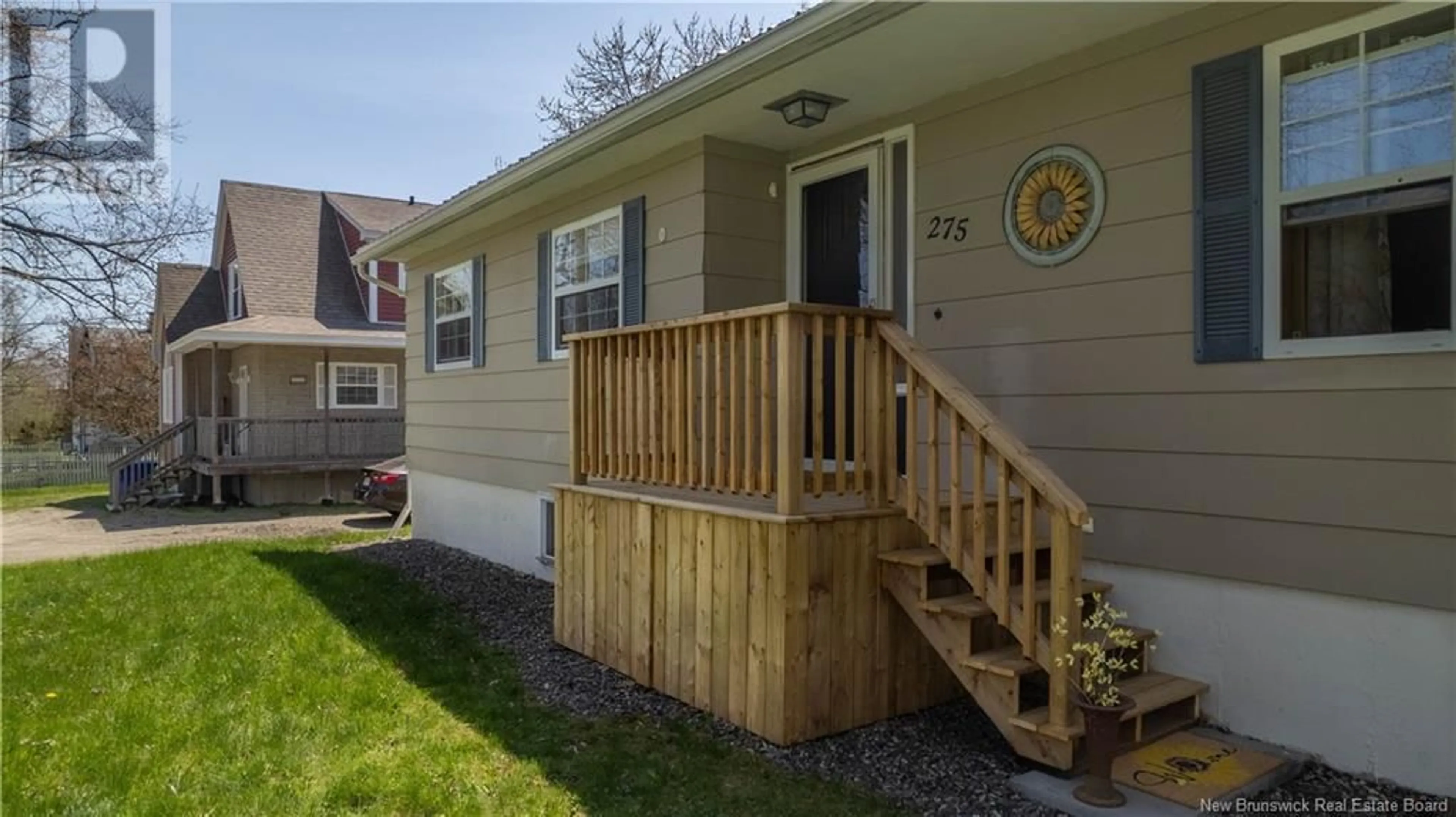 Home with vinyl exterior material, street for 275 PRINCE OF WALES, Saint Andrews New Brunswick E5B1P6