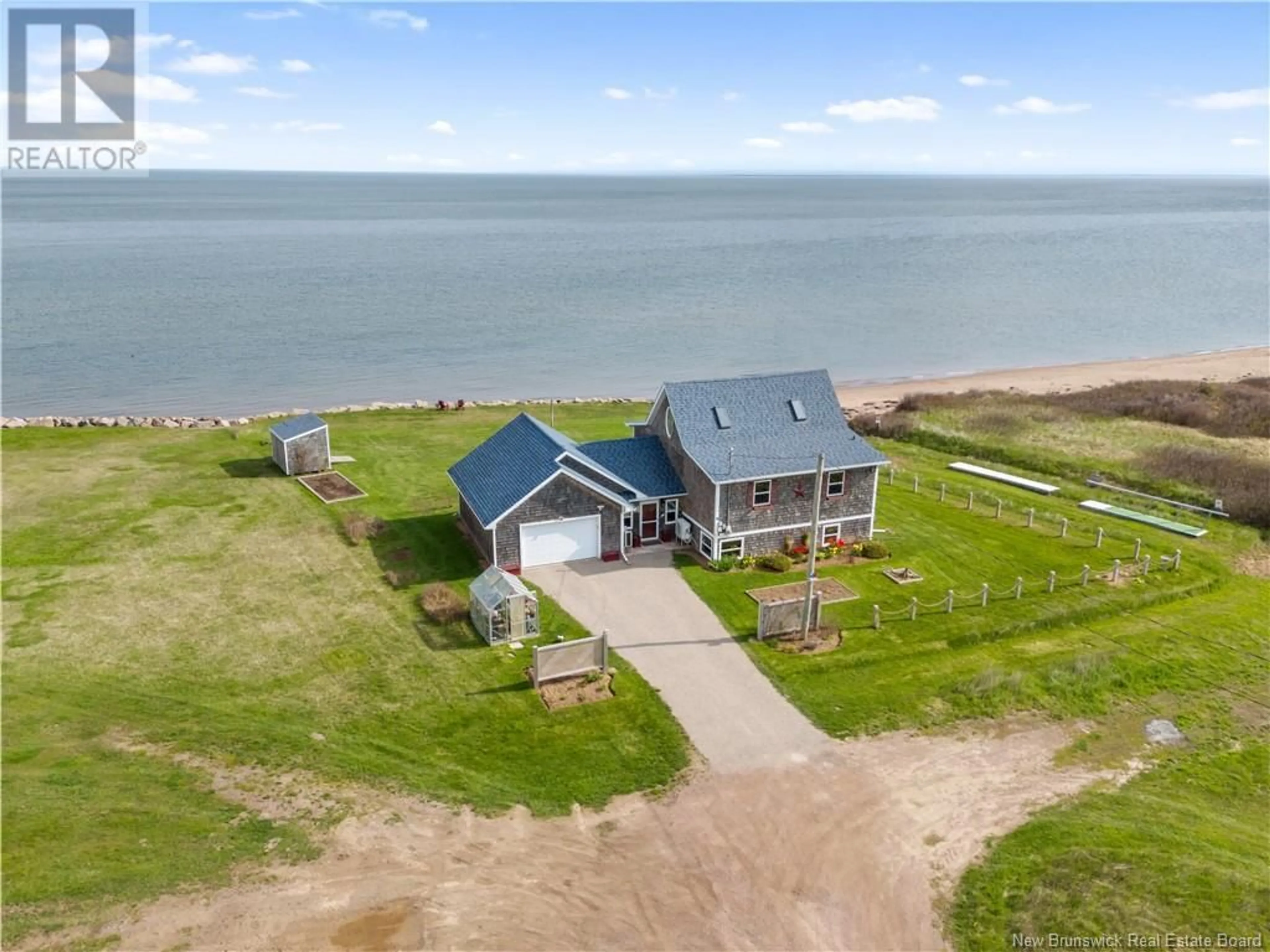 A pic from outside/outdoor area/front of a property/back of a property/a pic from drone, water/lake/river/ocean view for 54 ALPHEE, Cap-Pelé New Brunswick E4N1G9
