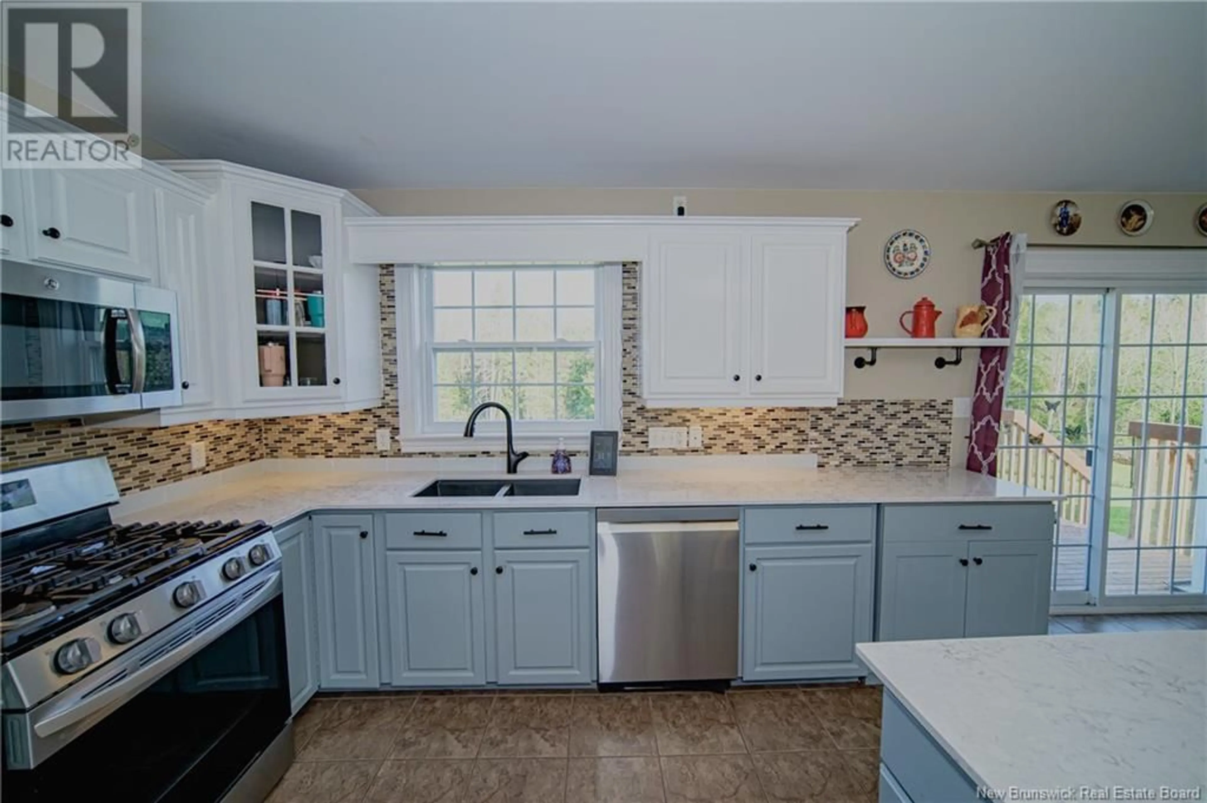 Open concept kitchen, ceramic/tile floor for 39 KELTY COURT, Burton New Brunswick E2V4R8