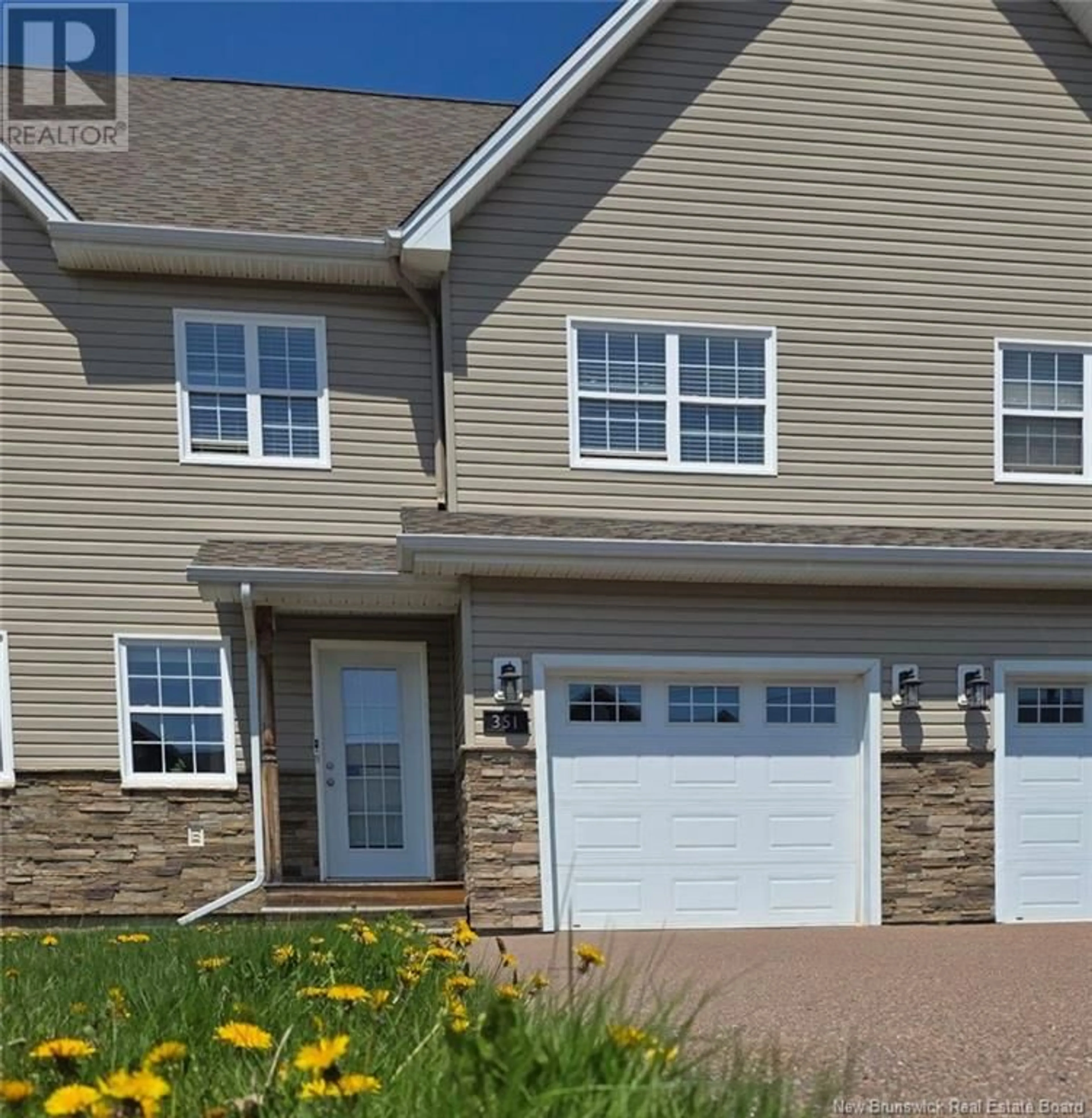 Home with vinyl exterior material, street for 351 DOLBEAU STREET, Dieppe New Brunswick E1A4H8