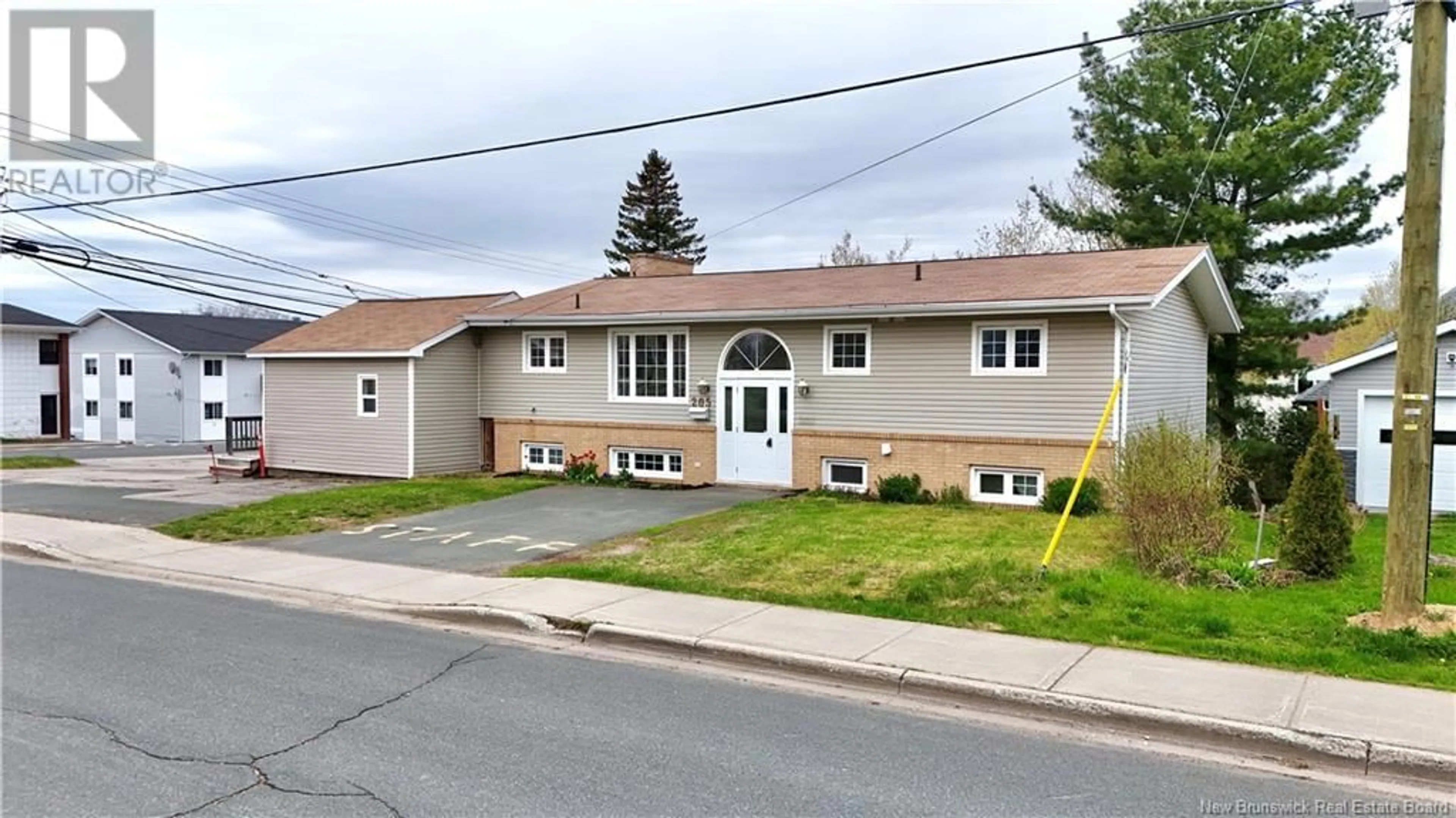 Home with vinyl exterior material, street for 205 YORK, Bathurst New Brunswick E2A1G9