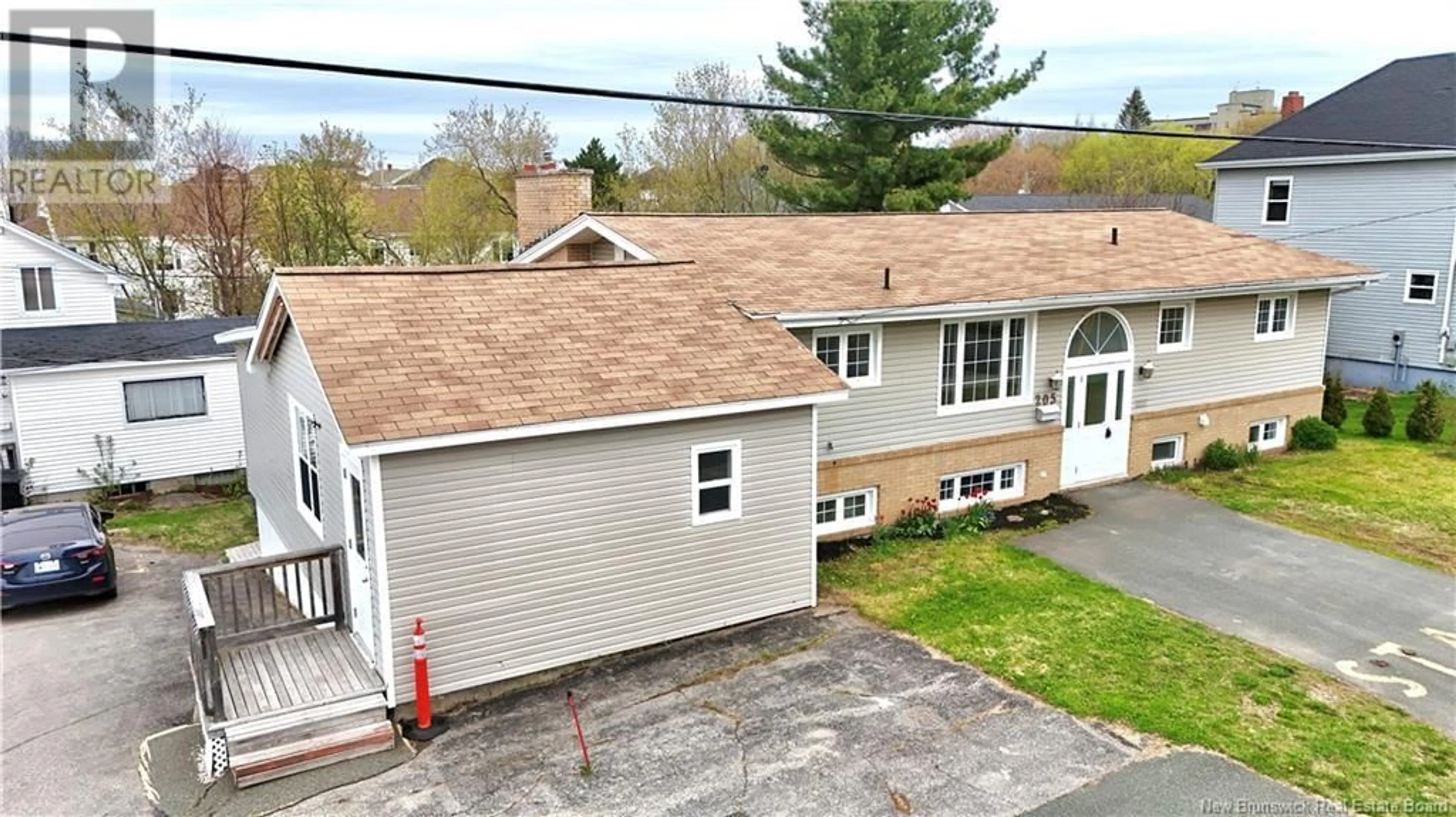 A pic from outside/outdoor area/front of a property/back of a property/a pic from drone, street for 205 YORK, Bathurst New Brunswick E2A1G9