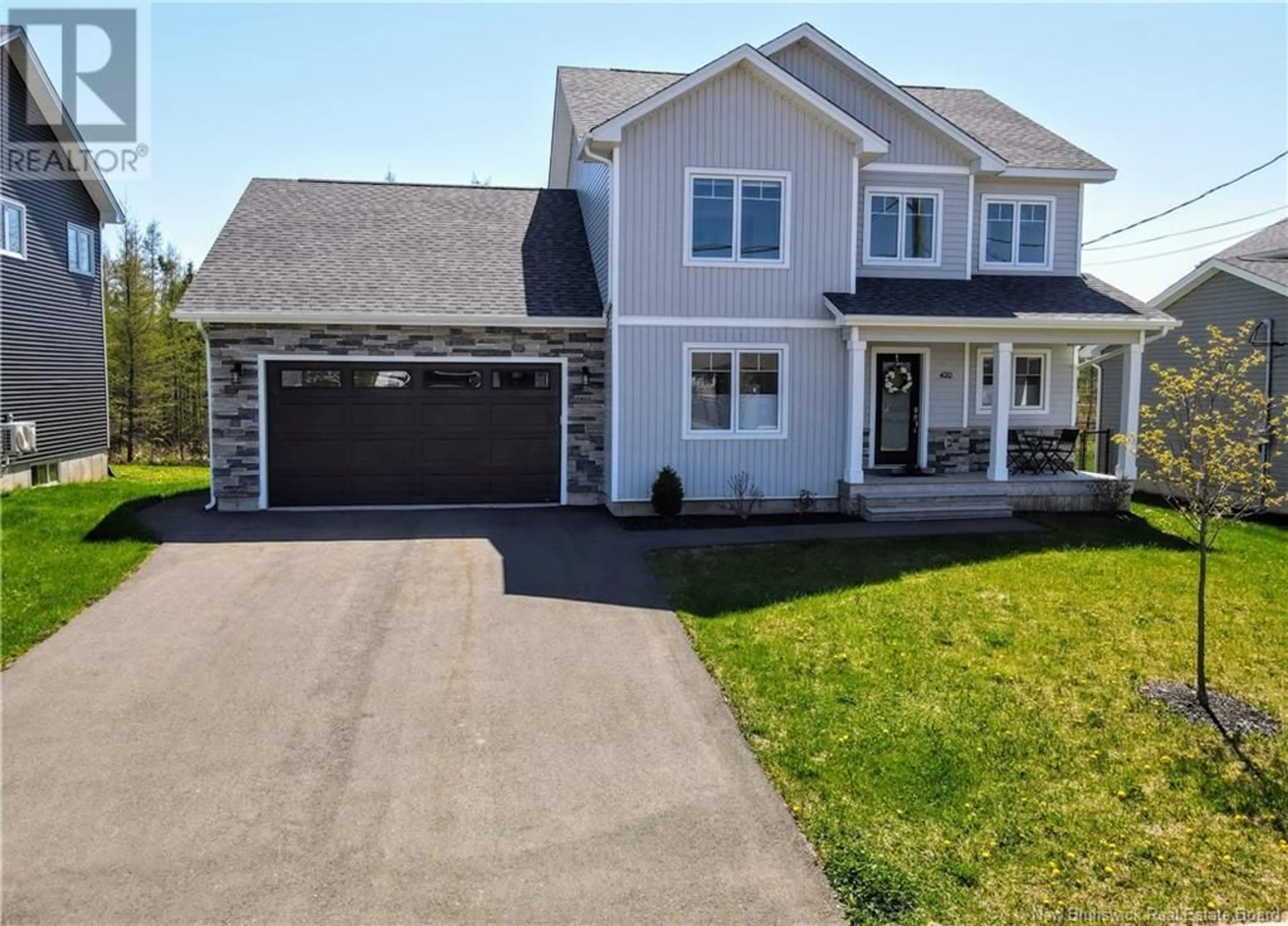A pic from outside/outdoor area/front of a property/back of a property/a pic from drone, street for 420 MAPLEHURST DRIVE, Moncton New Brunswick E1G6C9