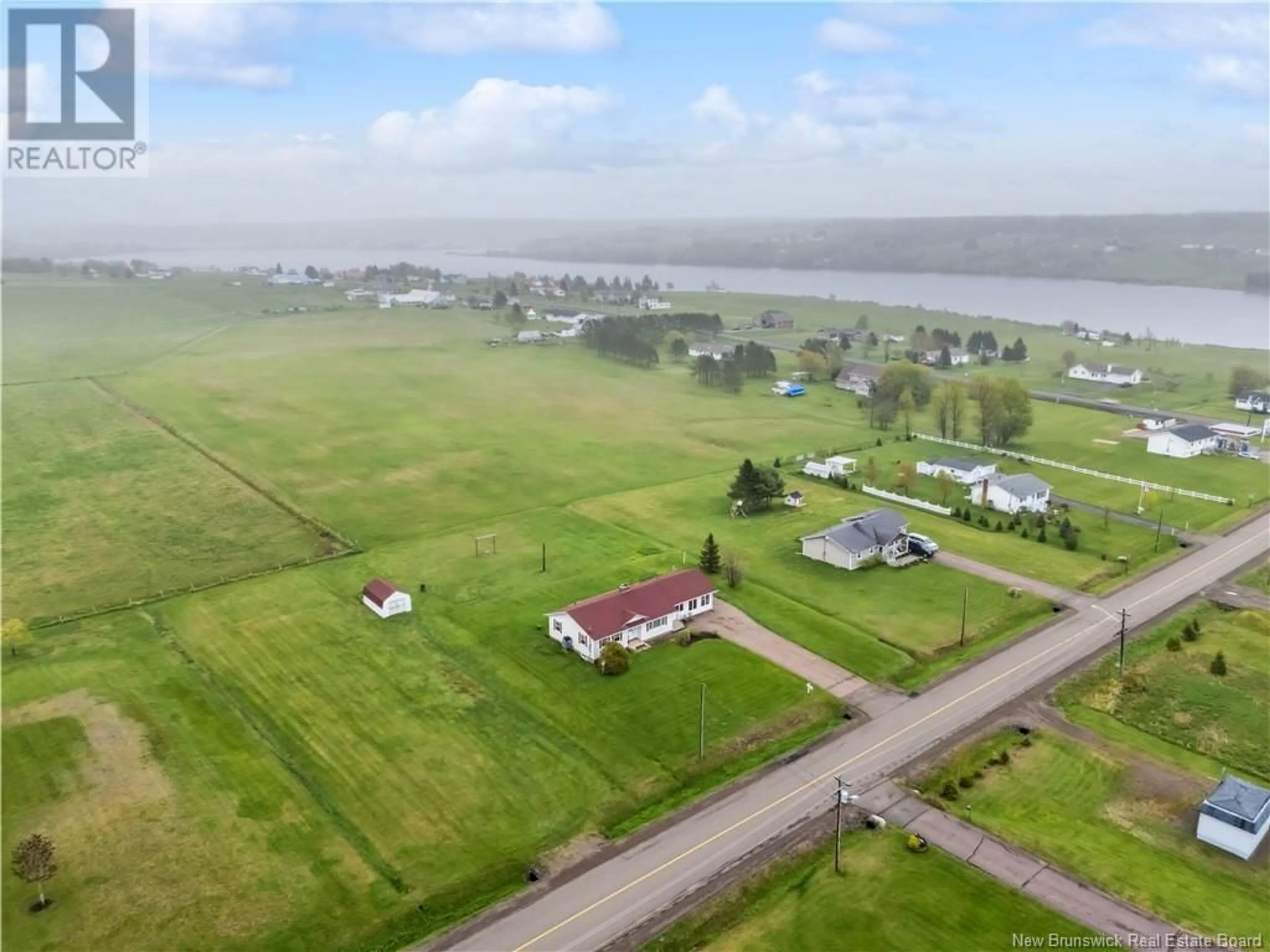 A pic from outside/outdoor area/front of a property/back of a property/a pic from drone, water/lake/river/ocean view for 6565 ROUTE 495, Sainte-Marie-De-Kent New Brunswick E4S4Z6