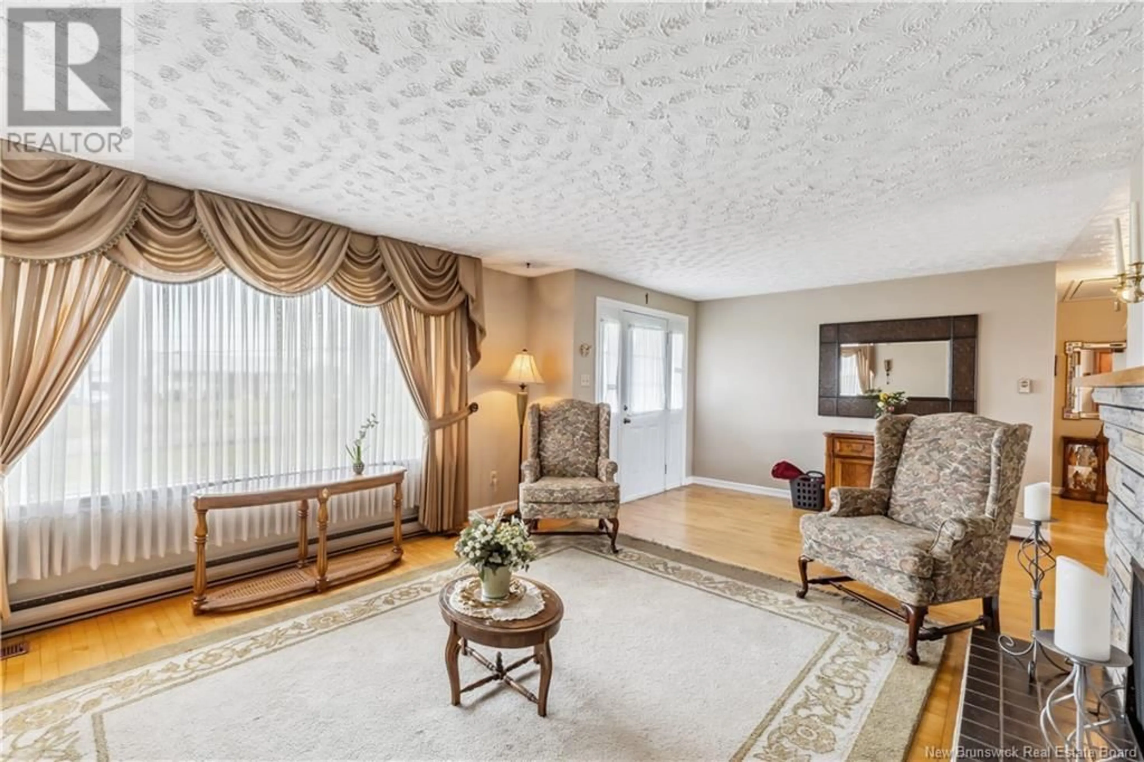 Living room with furniture, carpet floor for 6565 ROUTE 495, Sainte-Marie-De-Kent New Brunswick E4S4Z6