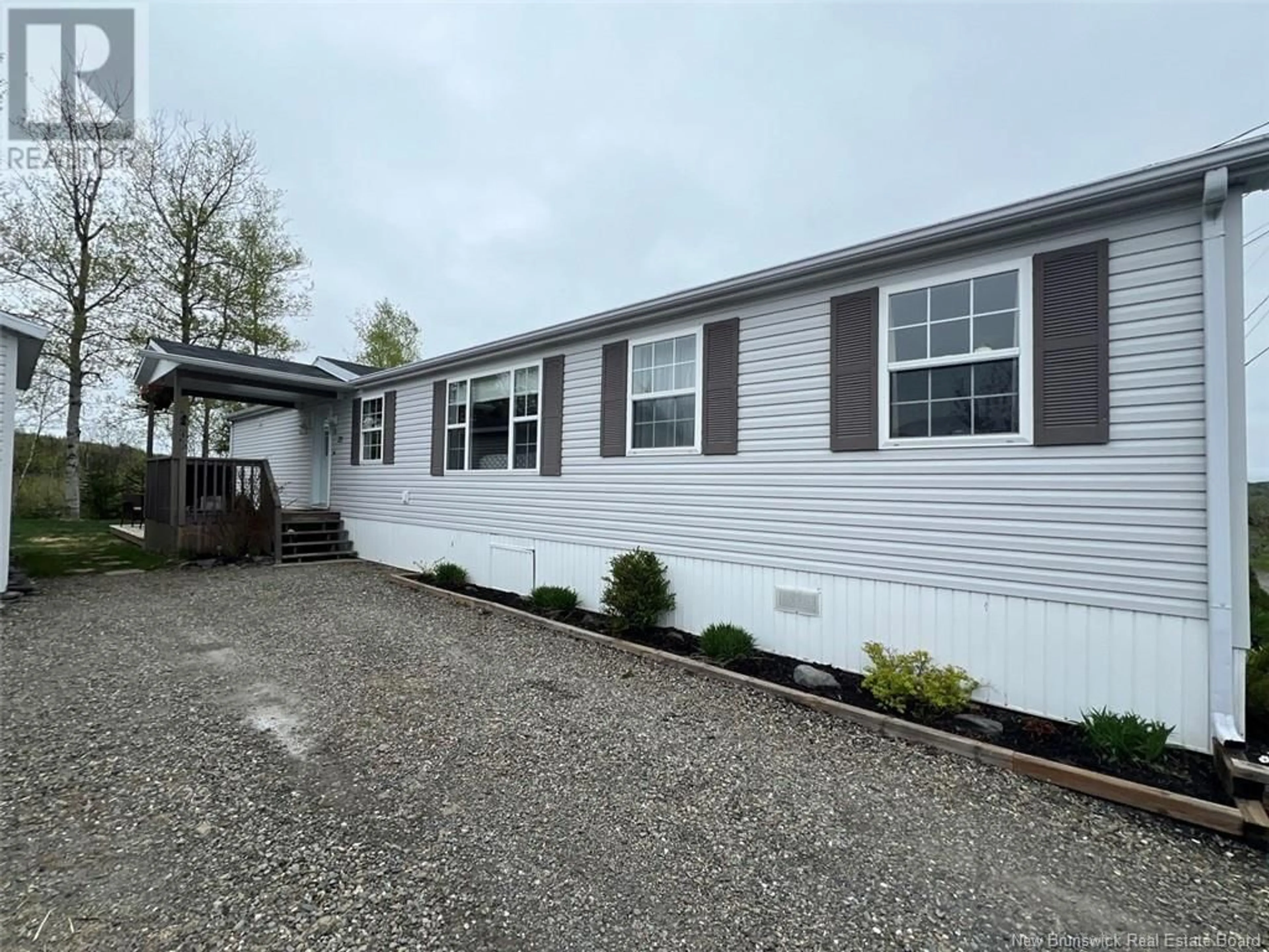 Home with vinyl exterior material, street for 27 LOMBARDIE STREET, Saint-Jacques New Brunswick E7B2X8