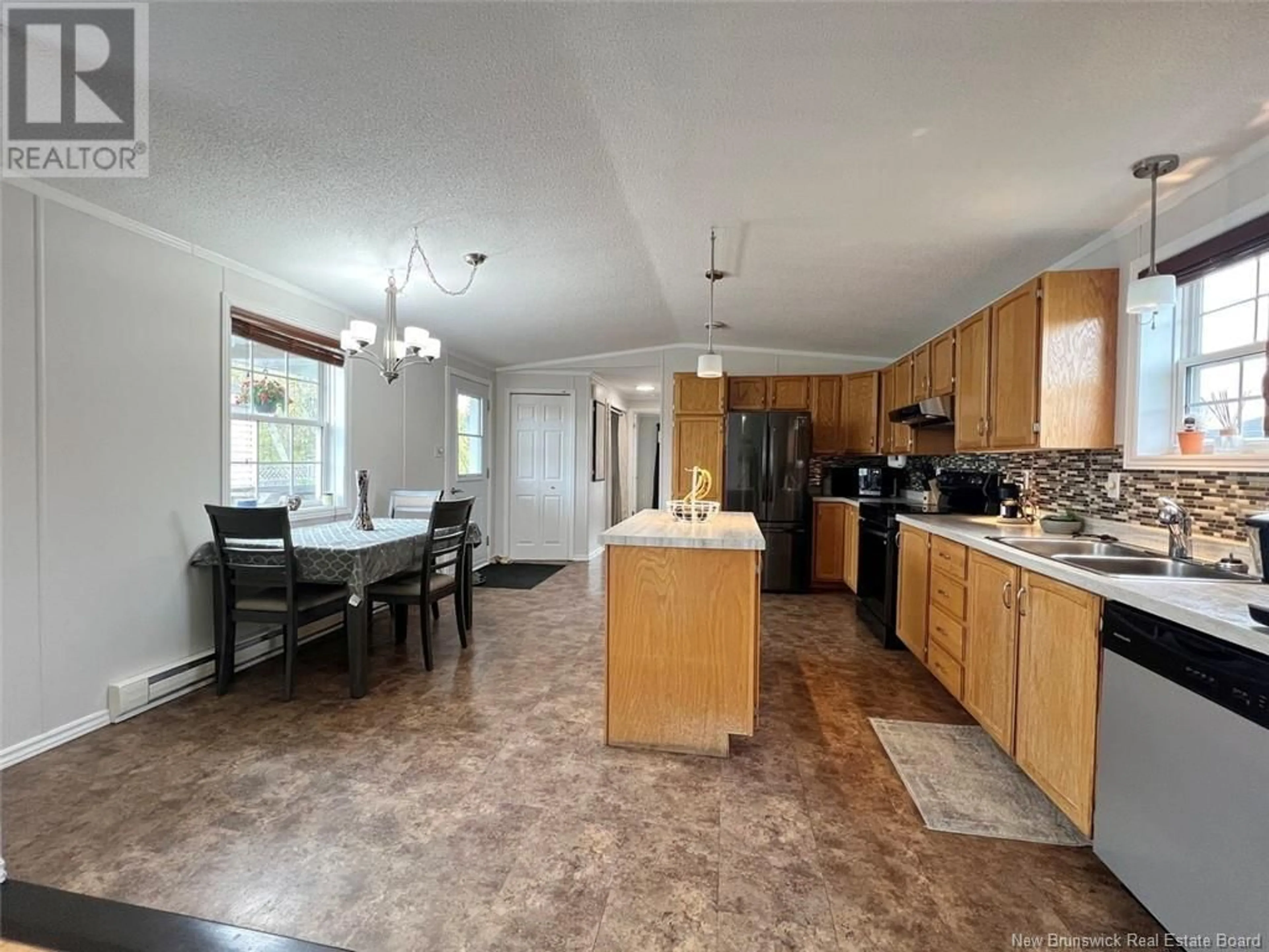 Open concept kitchen, ceramic/tile floor for 27 LOMBARDIE STREET, Saint-Jacques New Brunswick E7B2X8