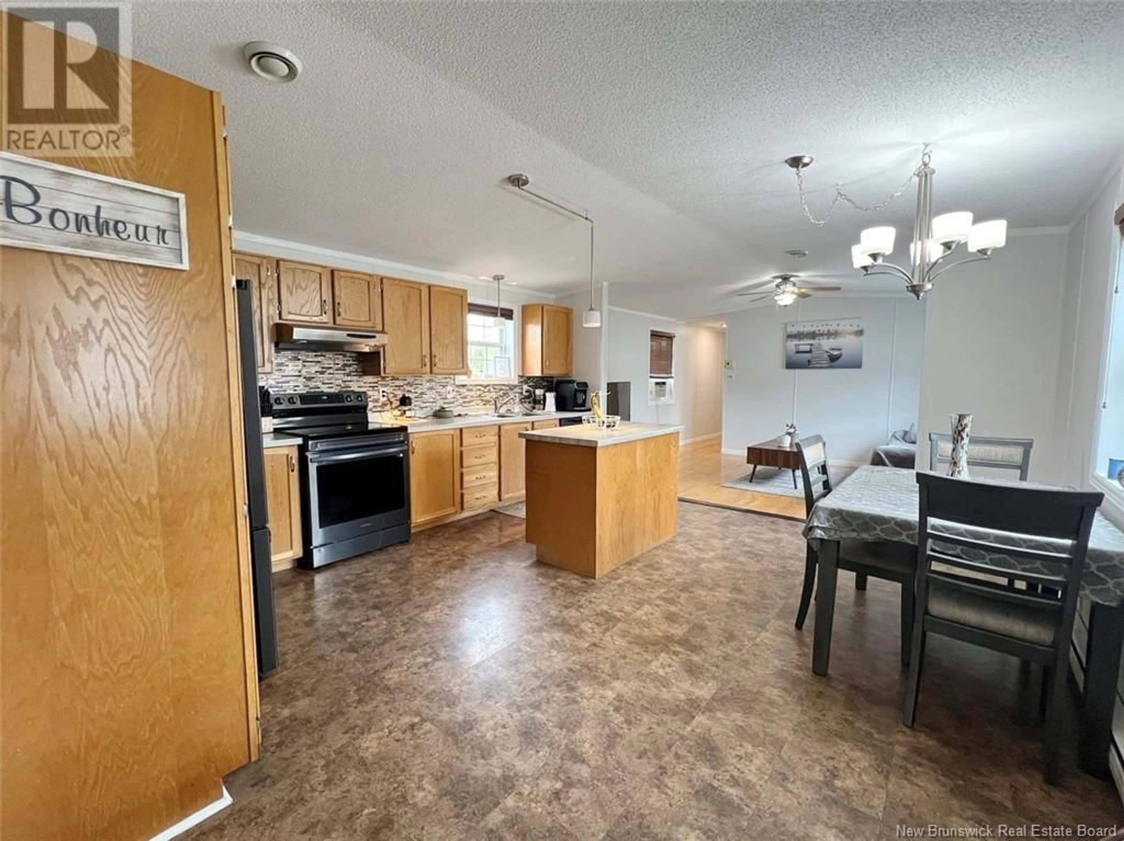 Open concept kitchen, ceramic/tile floor for 27 LOMBARDIE STREET, Saint-Jacques New Brunswick E7B2X8