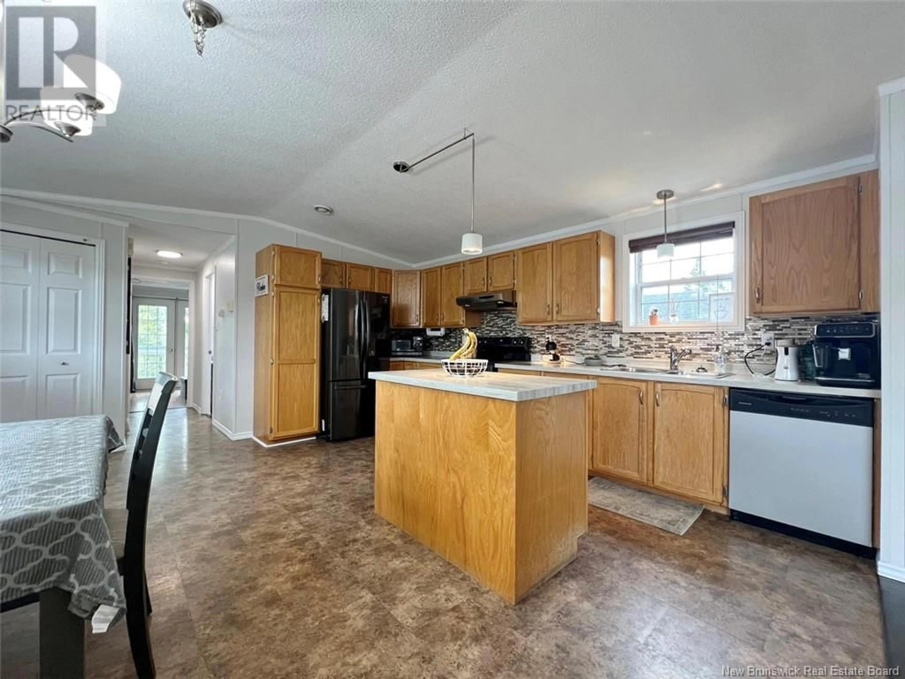 Open concept kitchen, ceramic/tile floor for 27 LOMBARDIE STREET, Saint-Jacques New Brunswick E7B2X8