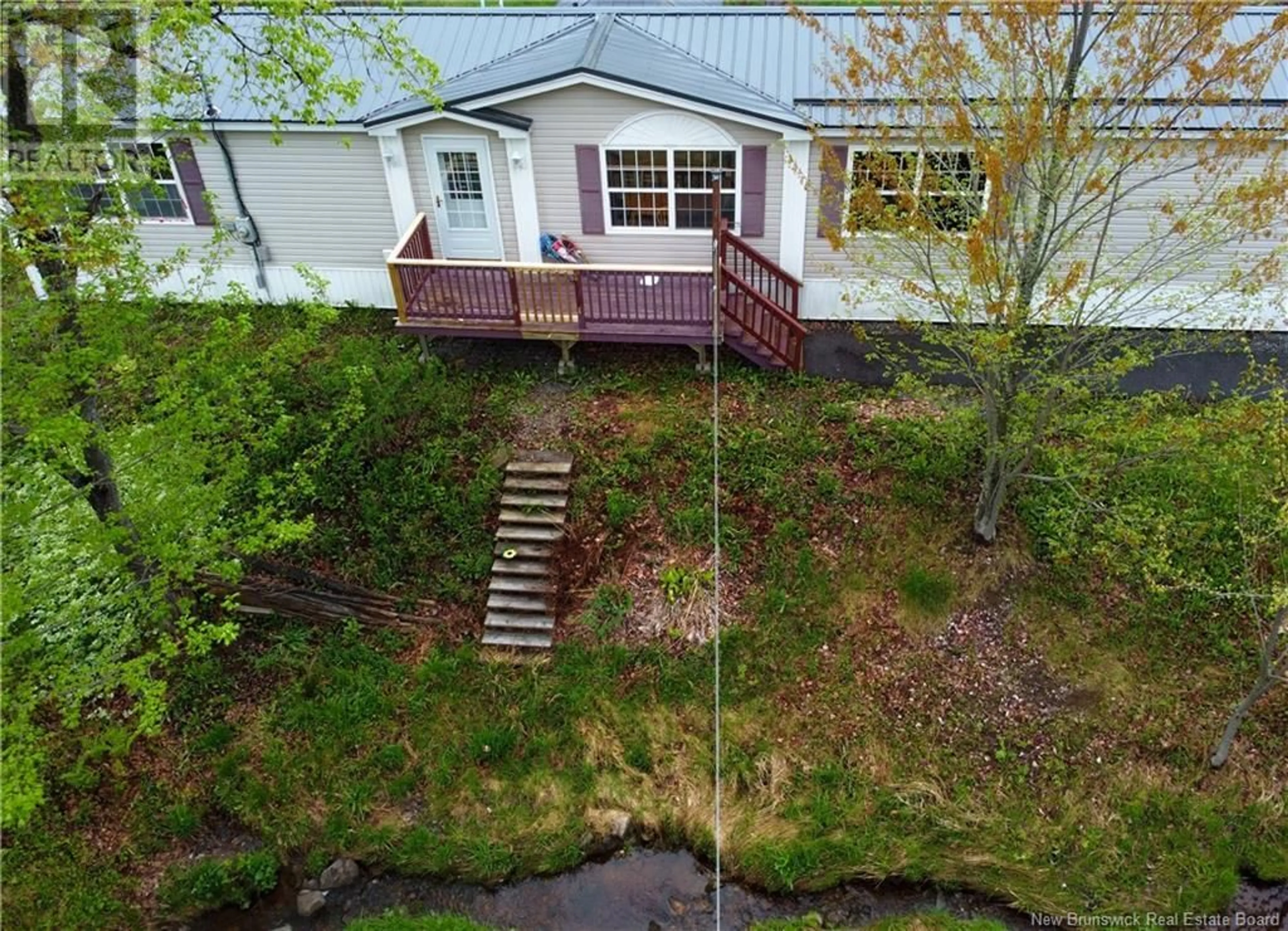 A pic from outside/outdoor area/front of a property/back of a property/a pic from drone, unknown for 4661 HERITAGE DRIVE, Tracy New Brunswick E5L1C6