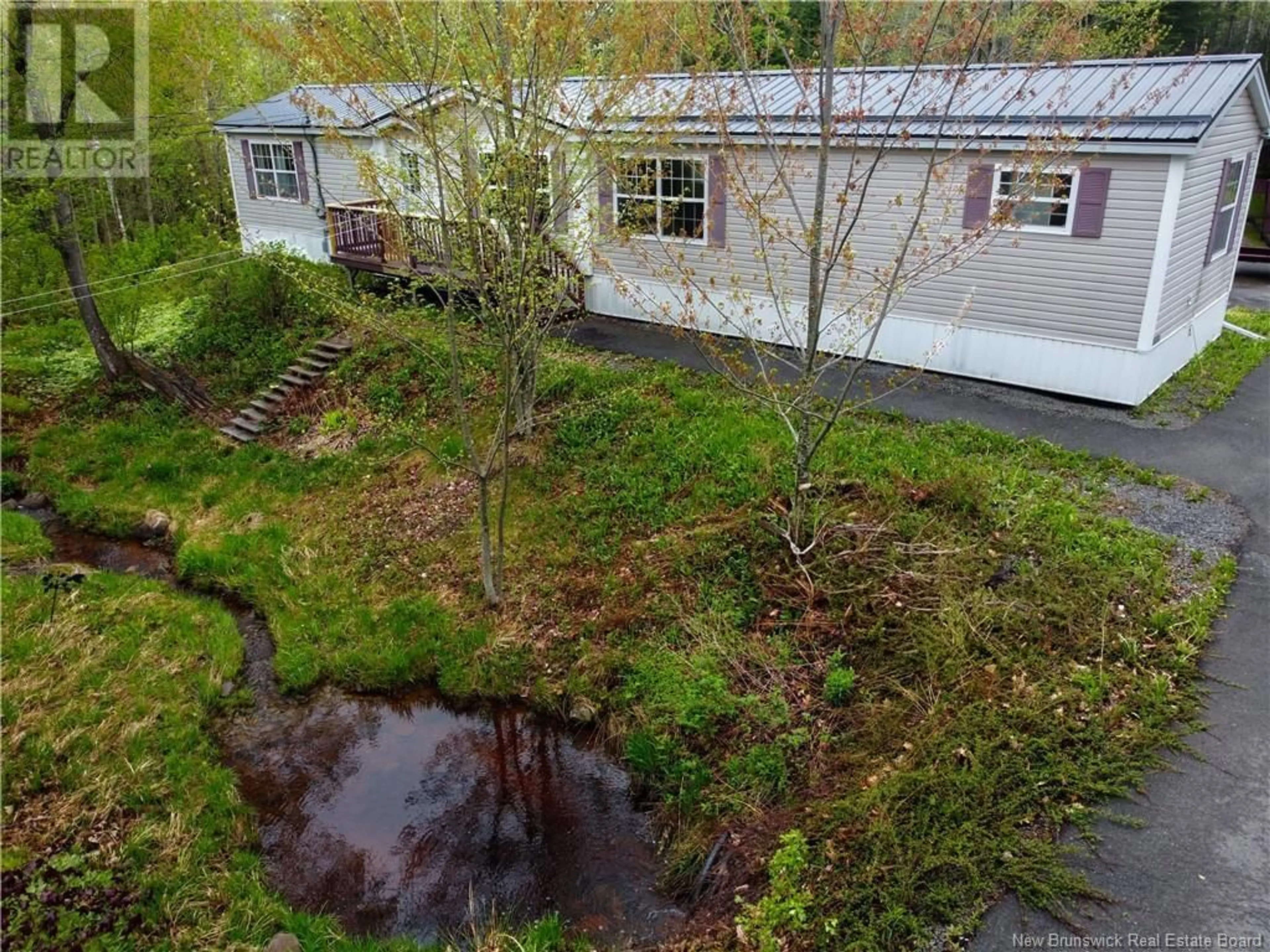 A pic from outside/outdoor area/front of a property/back of a property/a pic from drone, unknown for 4661 HERITAGE DRIVE, Tracy New Brunswick E5L1C6