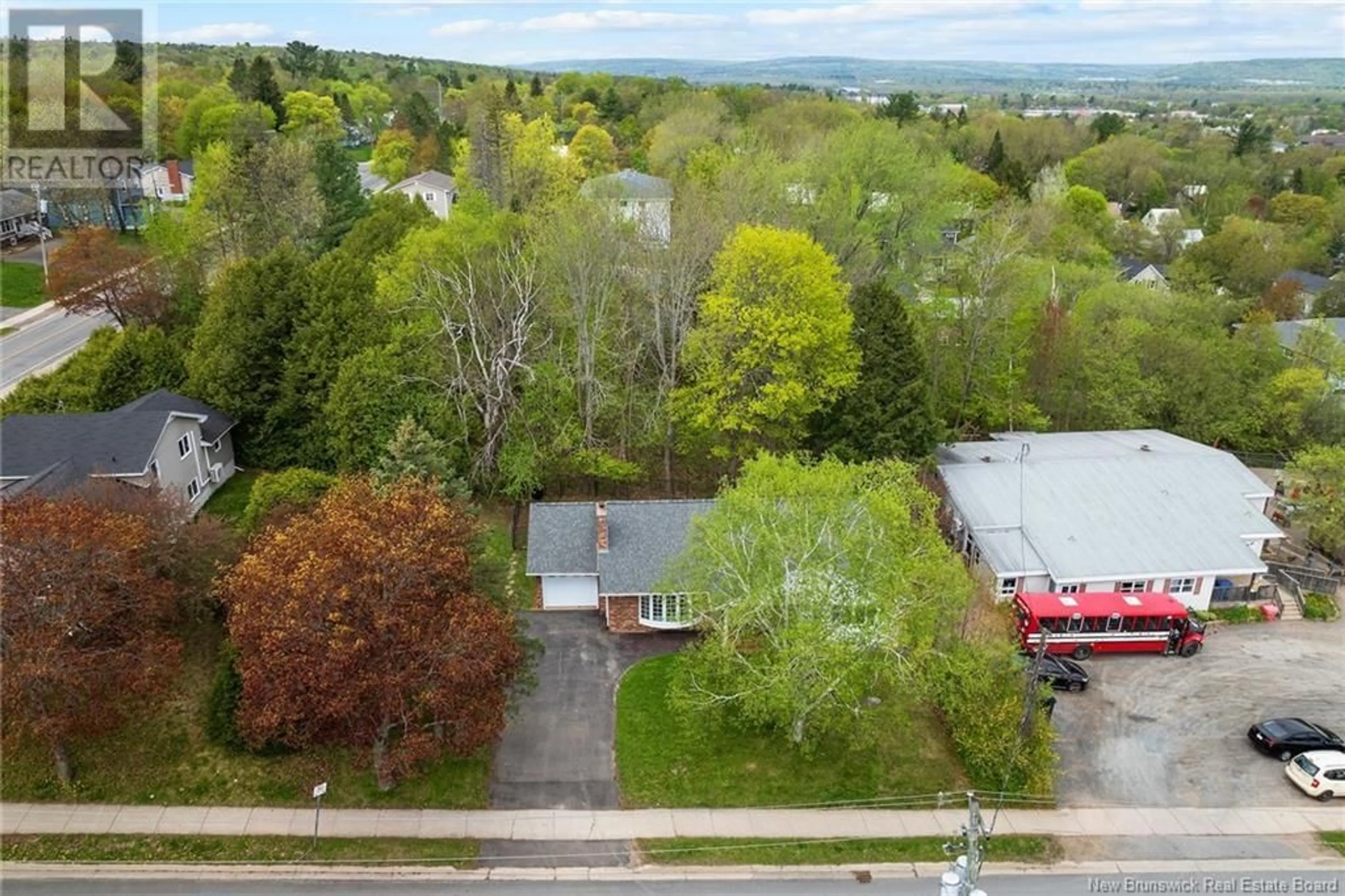 A pic from outside/outdoor area/front of a property/back of a property/a pic from drone, unknown for 727 WINDSOR STREET, Fredericton New Brunswick E3B4G3