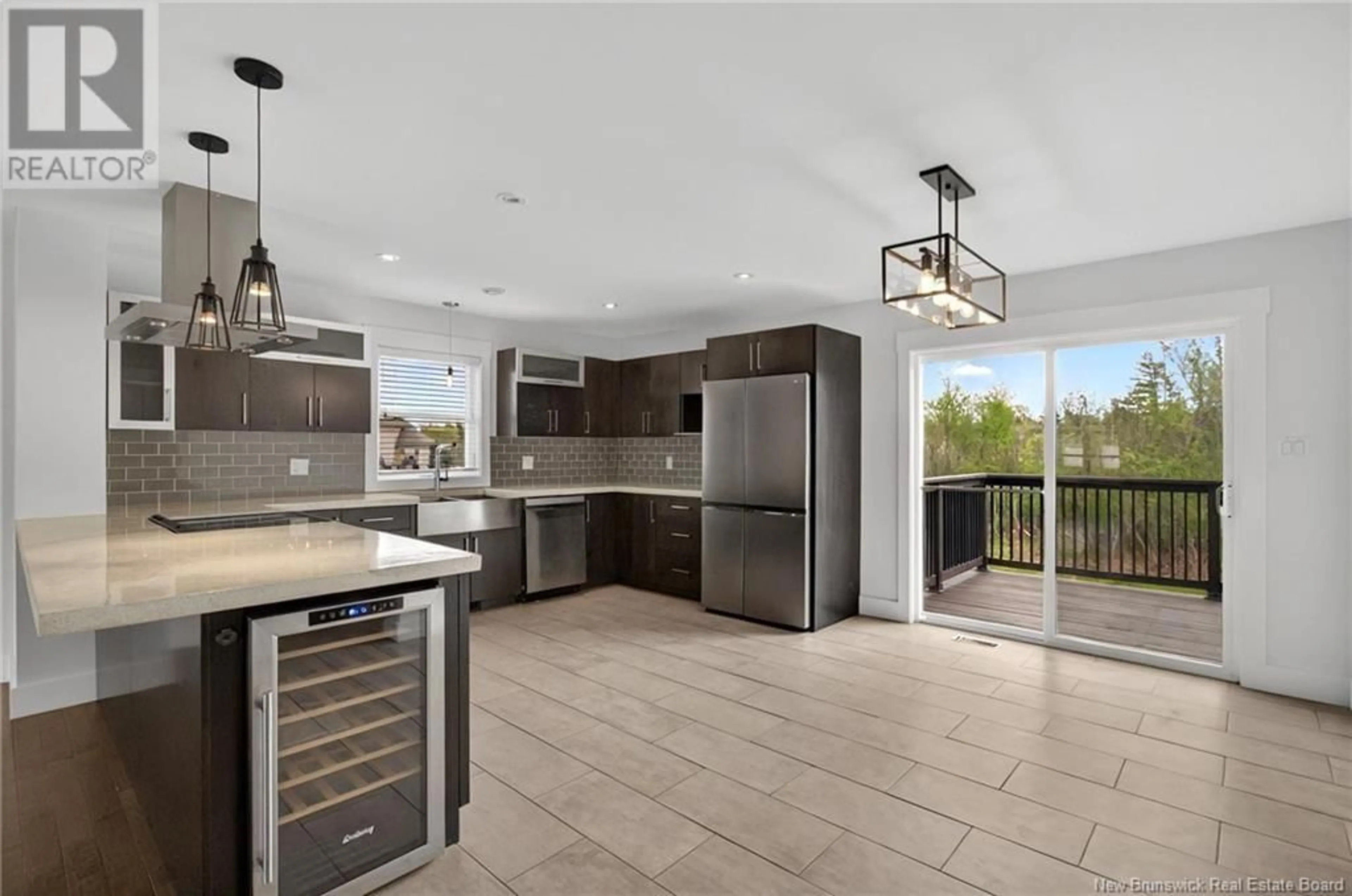 Open concept kitchen, ceramic/tile floor for 35 DORA COURT, Cap-Pelé New Brunswick E4N1C3