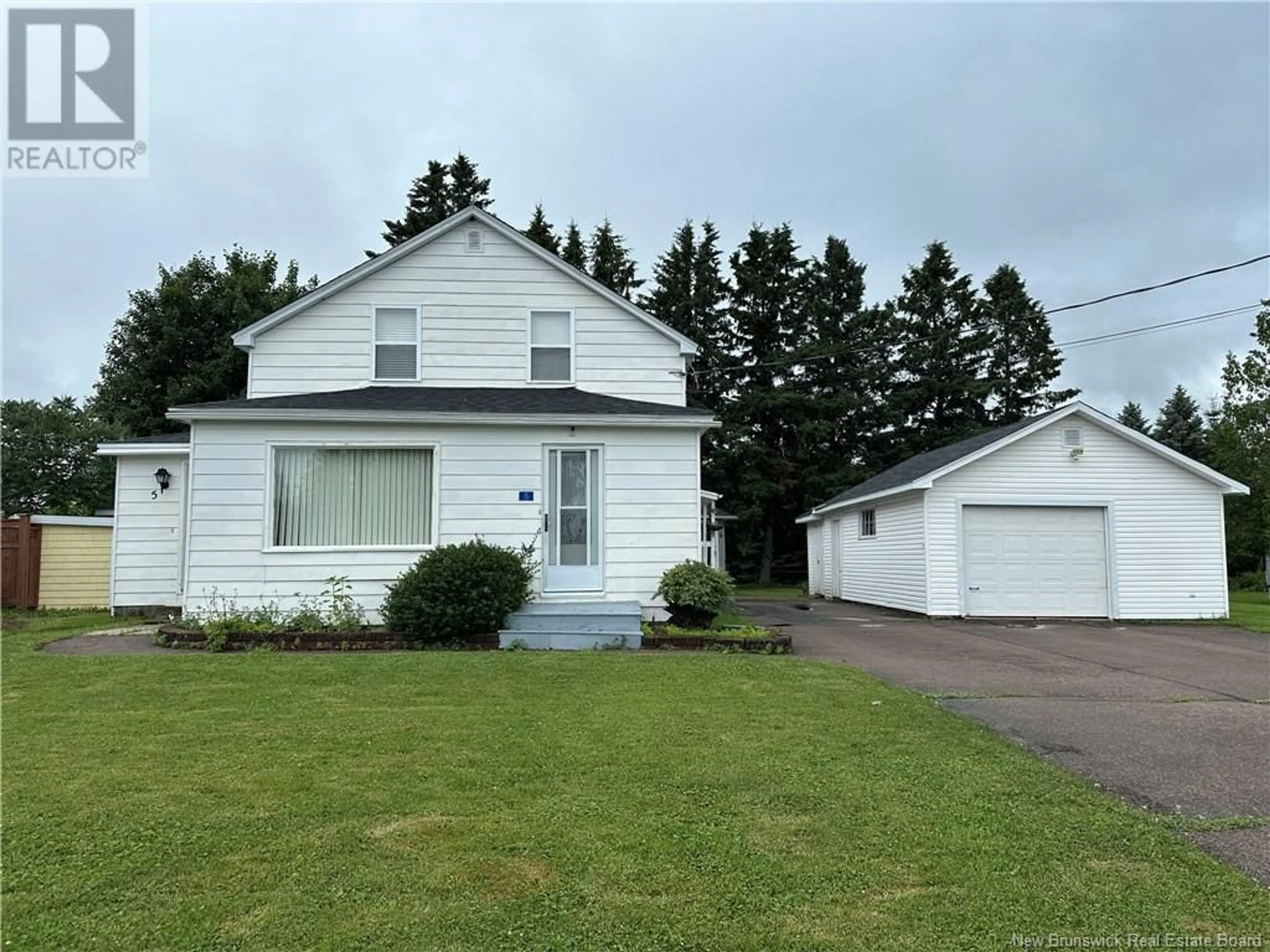 Home with vinyl exterior material, street for 5 EDOUARD AVENUE, Saint-Antoine New Brunswick E4V1G3