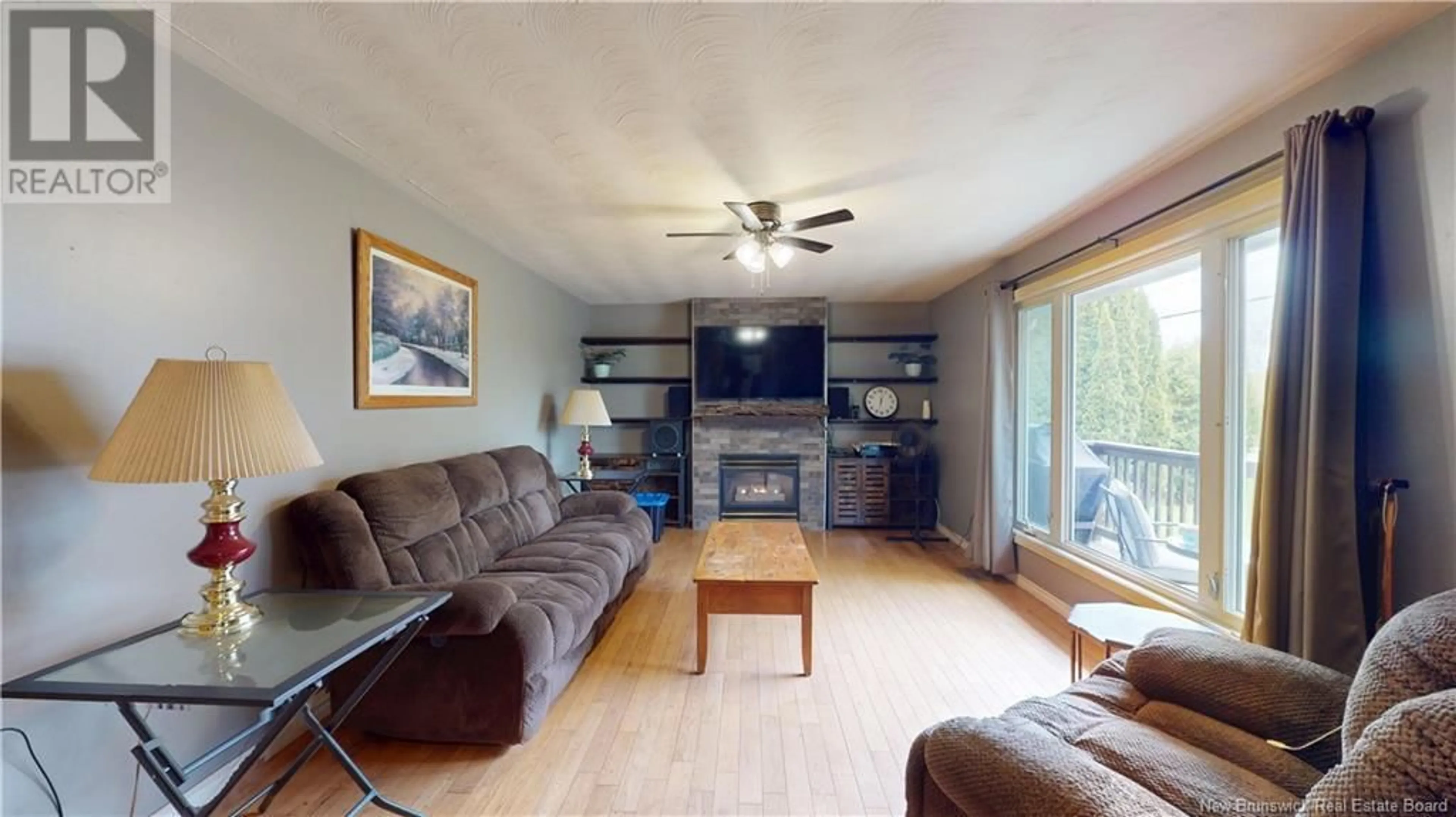Living room with furniture, wood/laminate floor for 3 DUTCH VALLEY ROAD, Sussex Corner New Brunswick E4E2Y2