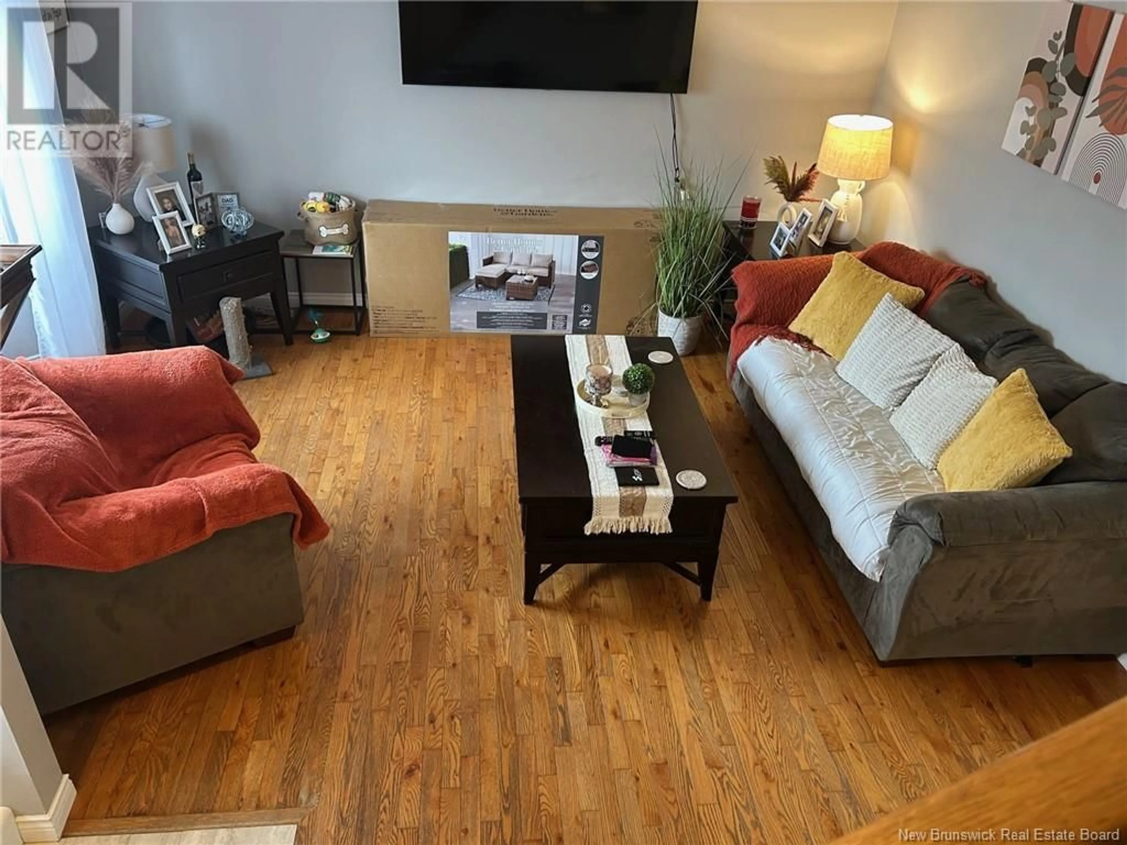 Living room with furniture, wood/laminate floor for 31 BOYANER CRESCENT, Saint John New Brunswick E2J4C8
