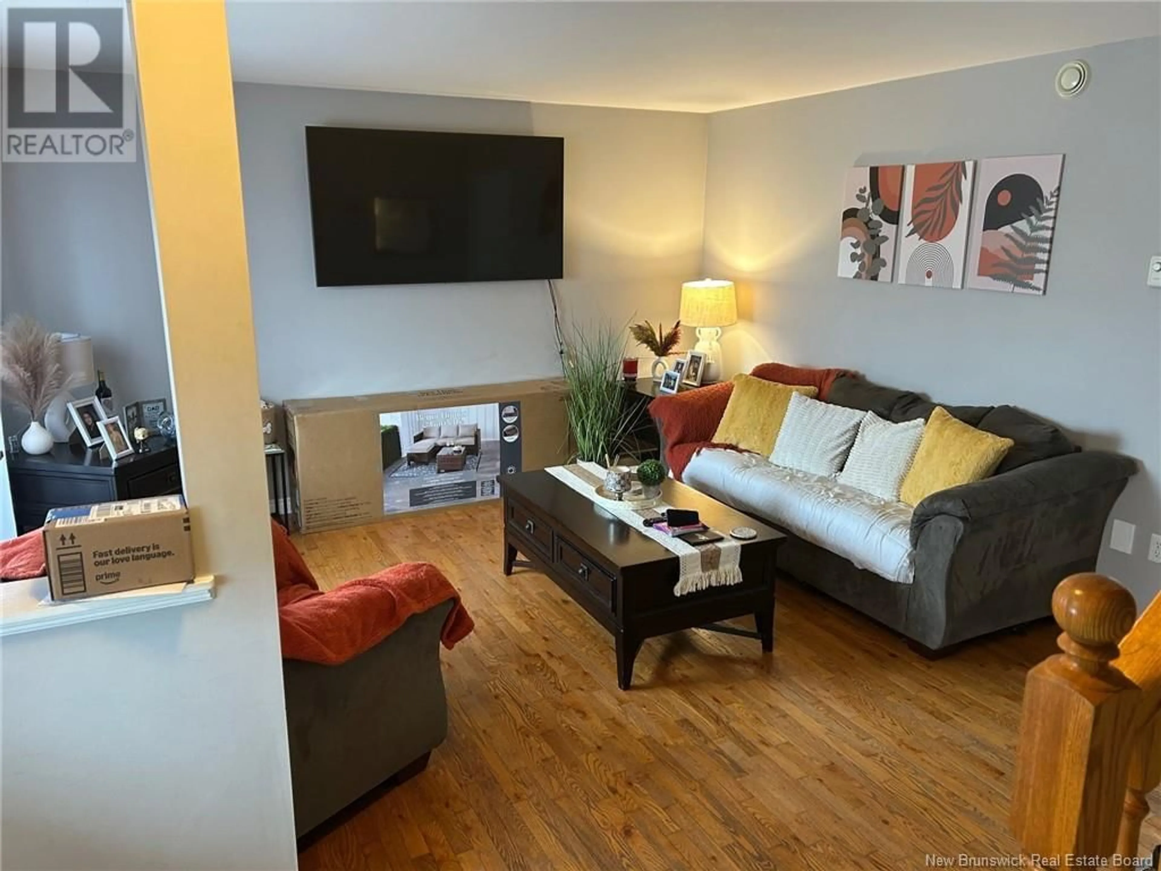 Living room with furniture, wood/laminate floor for 31 BOYANER CRESCENT, Saint John New Brunswick E2J4C8