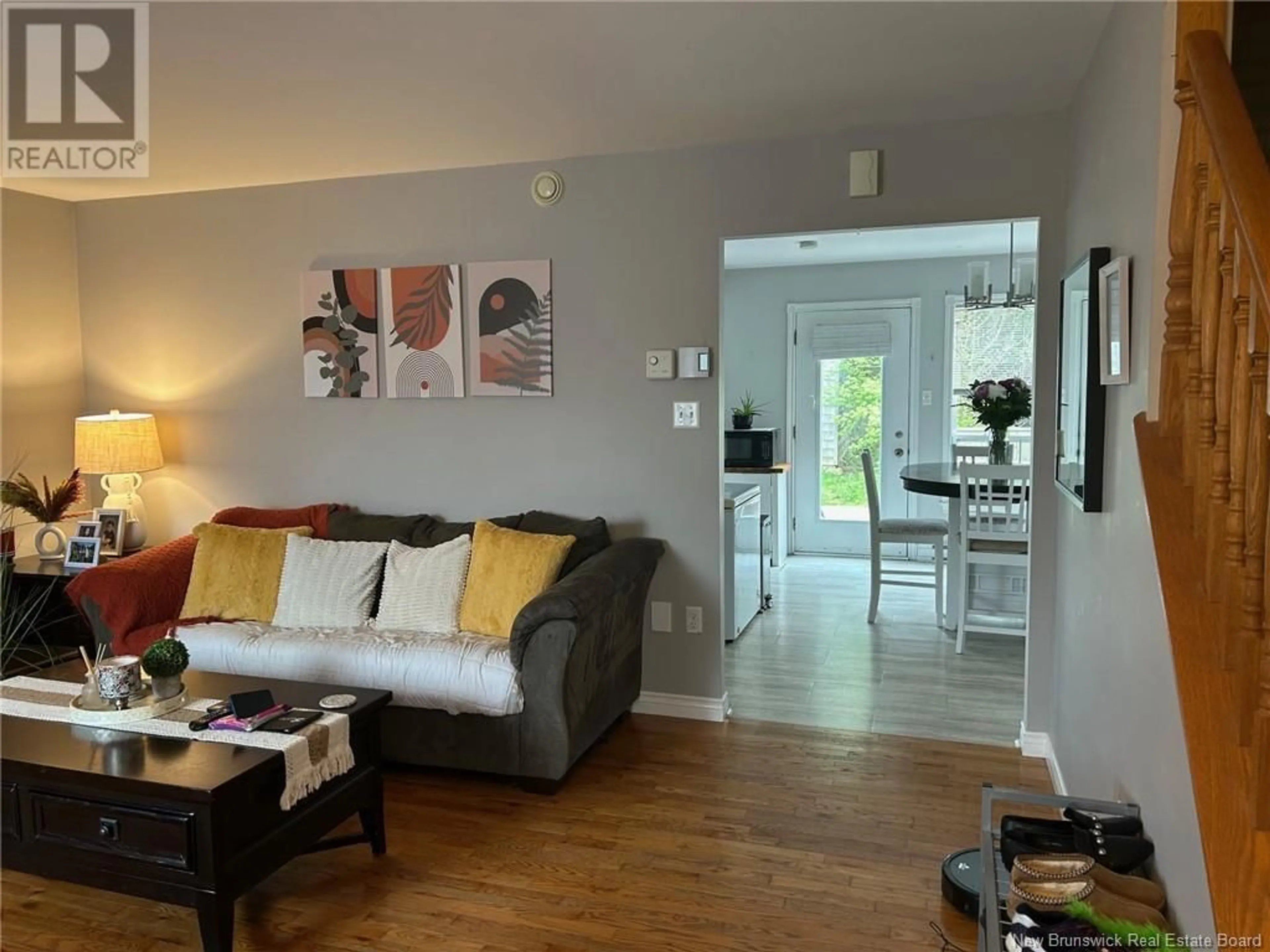 Living room with furniture, wood/laminate floor for 31 BOYANER CRESCENT, Saint John New Brunswick E2J4C8