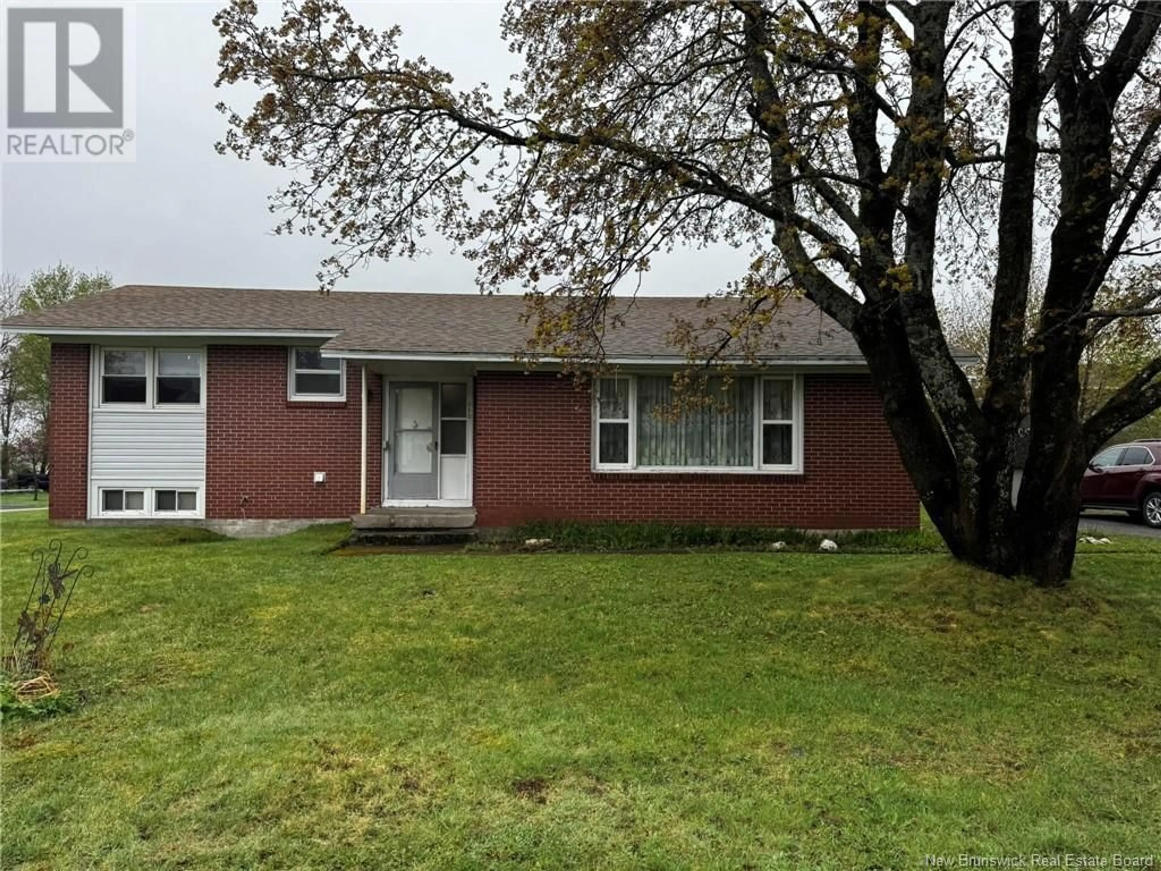 Home with vinyl exterior material, street for 310 MANDERSON DRIVE, Miramichi New Brunswick E1V1C4
