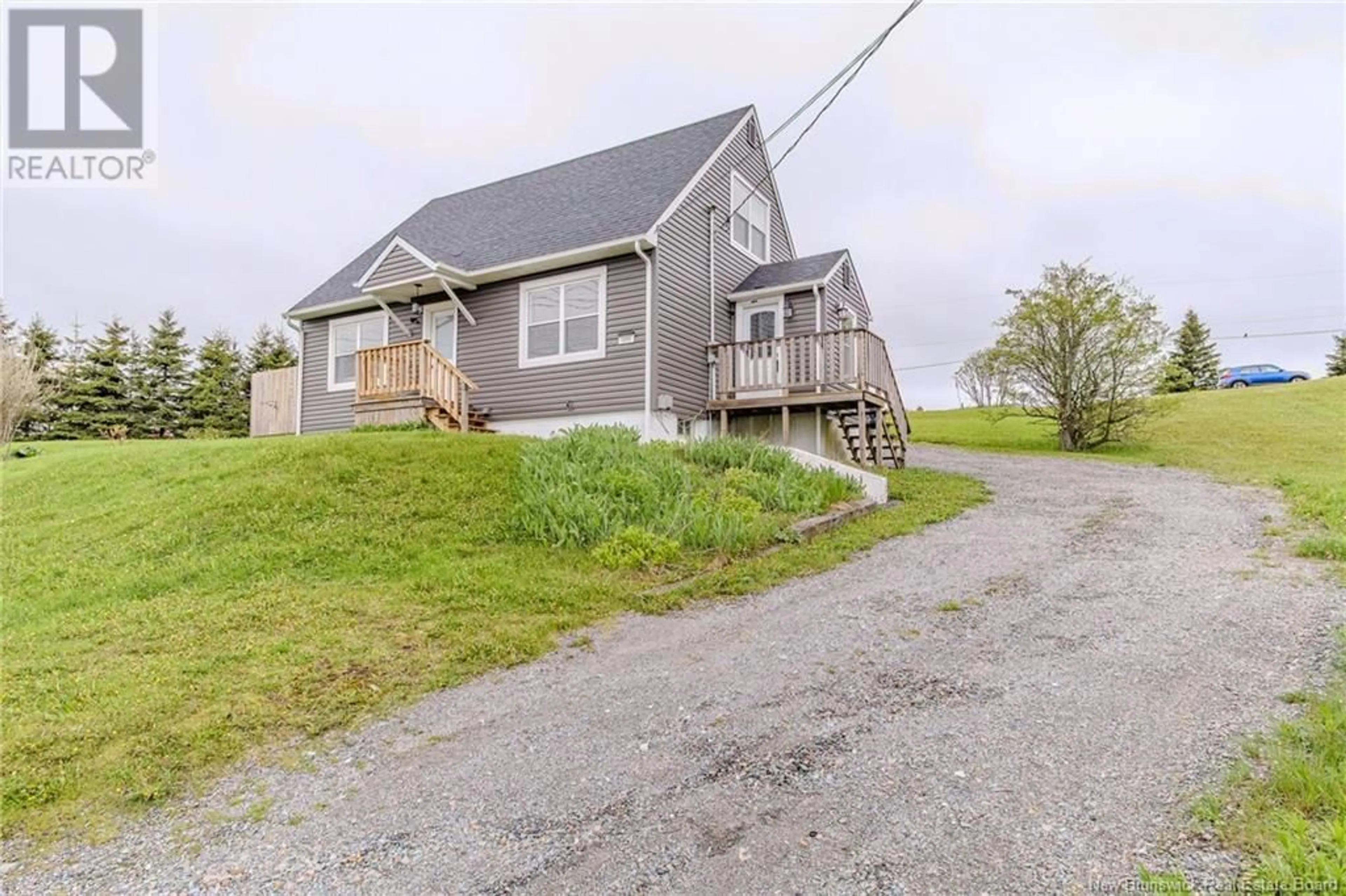 A pic from outside/outdoor area/front of a property/back of a property/a pic from drone, unknown for 999 LOCH LOMOND ROAD, Saint John New Brunswick E2J1Z6