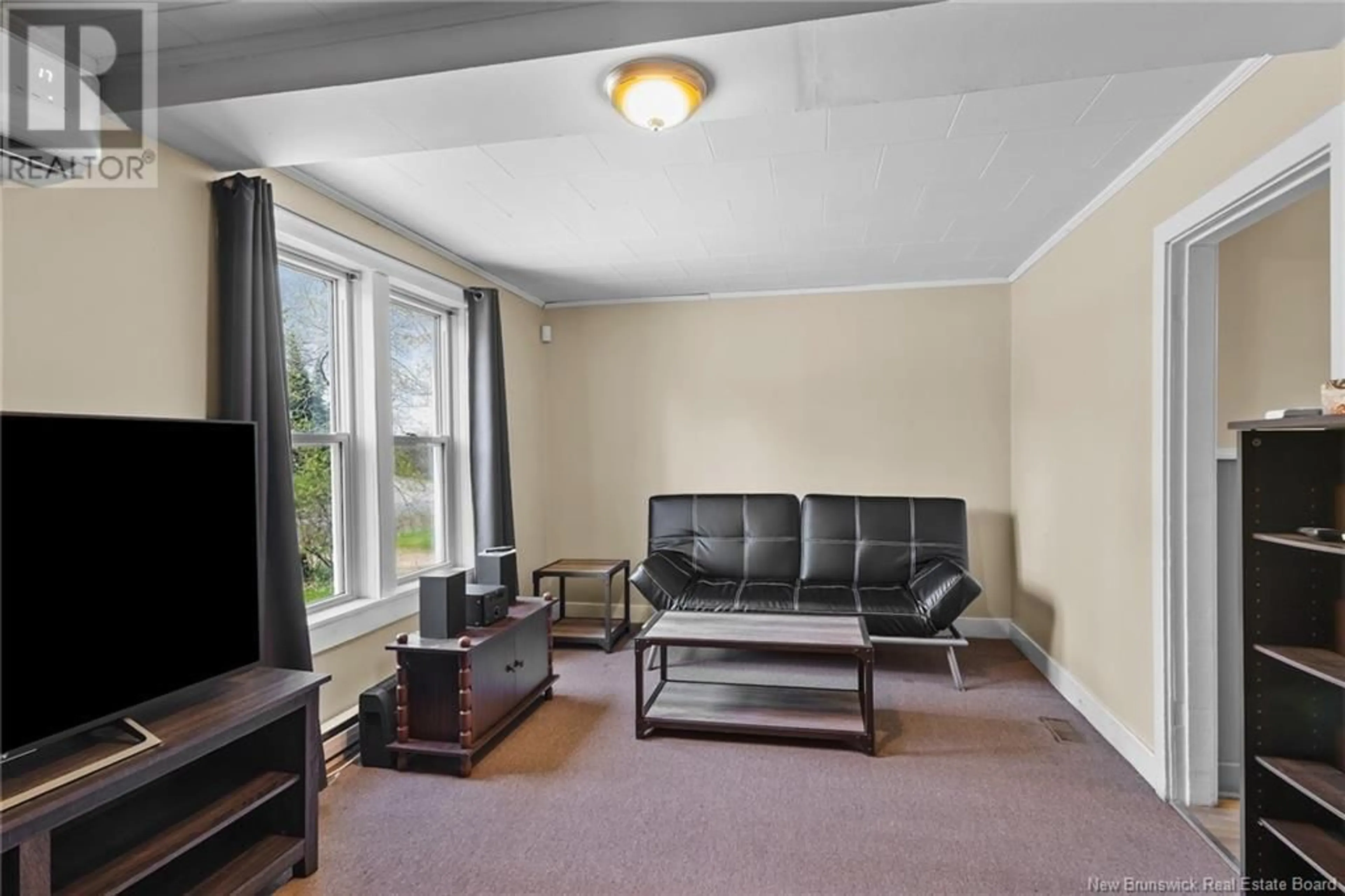 Living room with furniture, unknown for 72 MCLEOD AVENUE, Chipman New Brunswick E4A2B8
