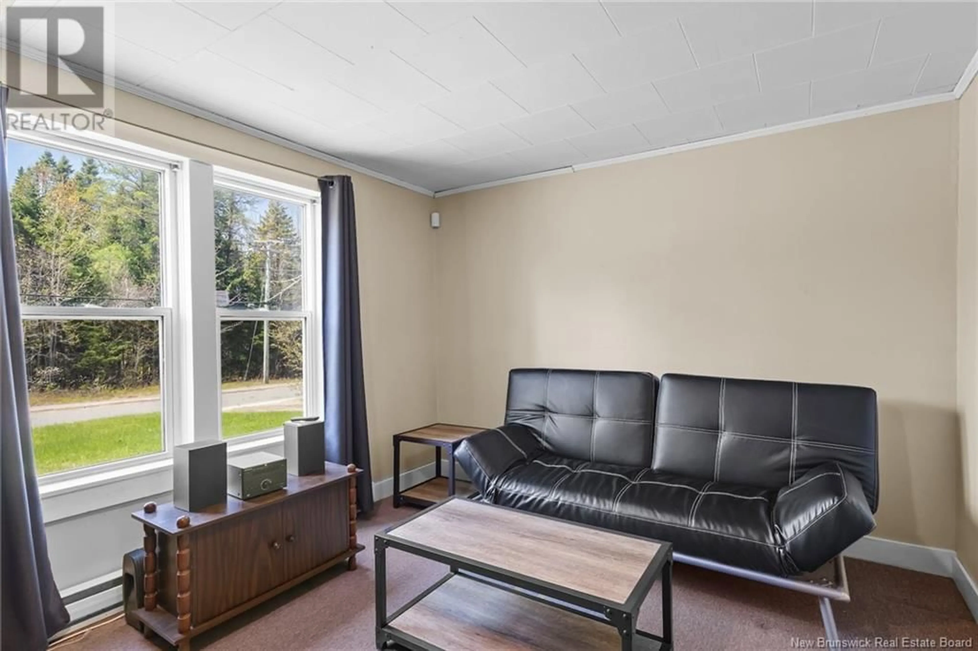 Living room with furniture, unknown for 72 MCLEOD AVENUE, Chipman New Brunswick E4A2B8