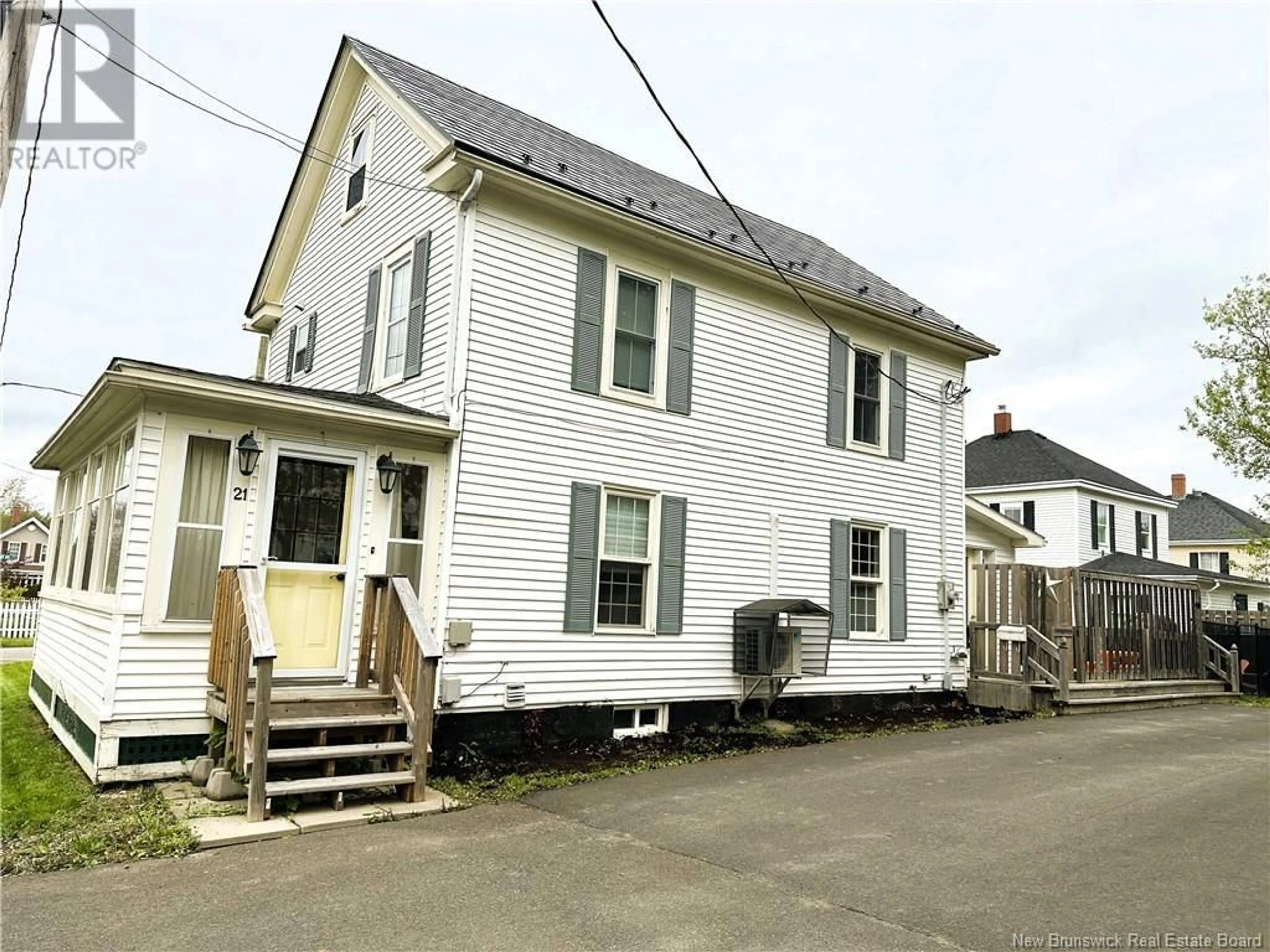 Home with vinyl exterior material, street for 21 ROSE STREET, St. Stephen New Brunswick E3L2P6