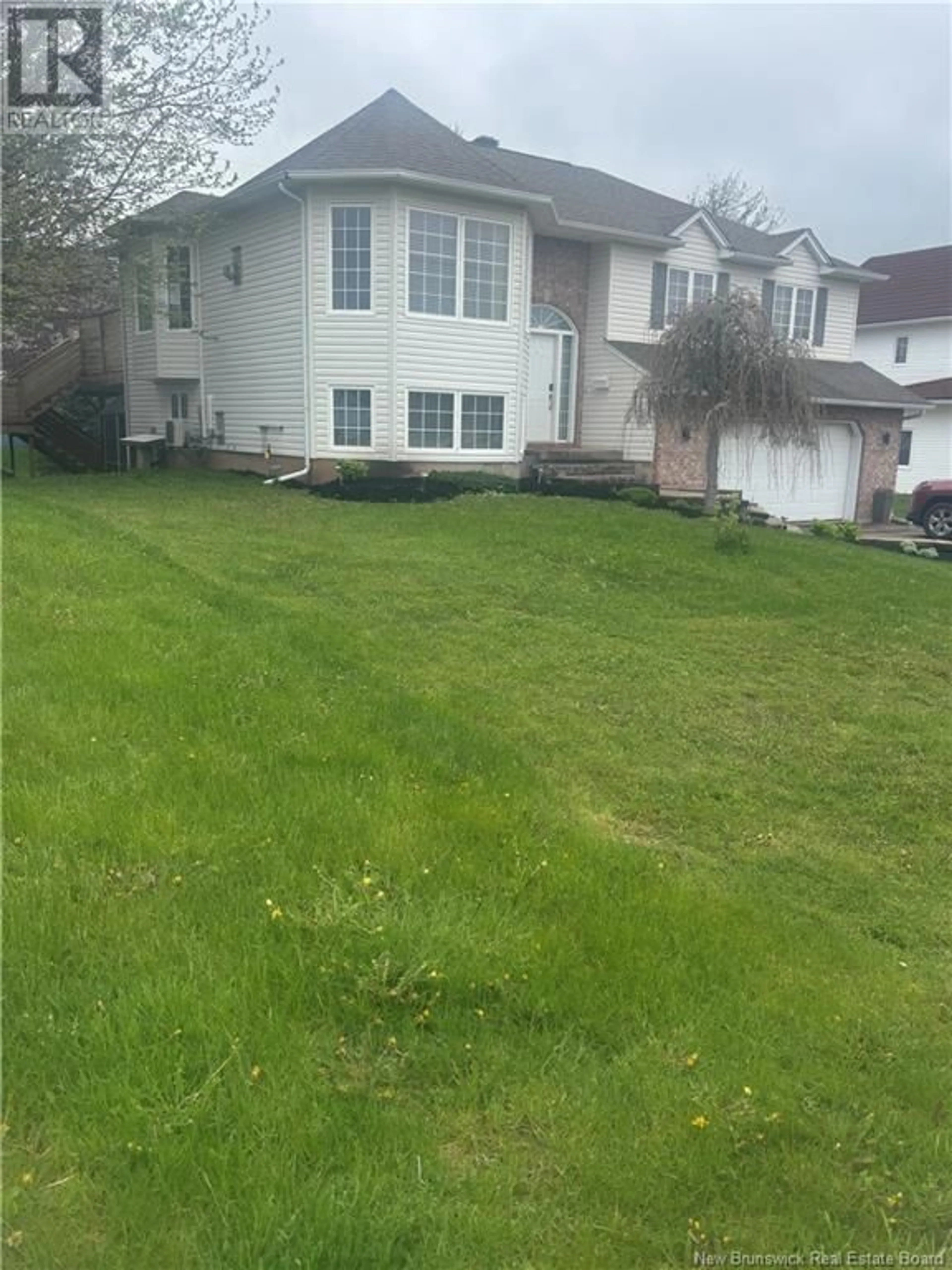 A pic from outside/outdoor area/front of a property/back of a property/a pic from drone, street for 11 FOXWOOD DRIVE, Moncton New Brunswick E1G3S6